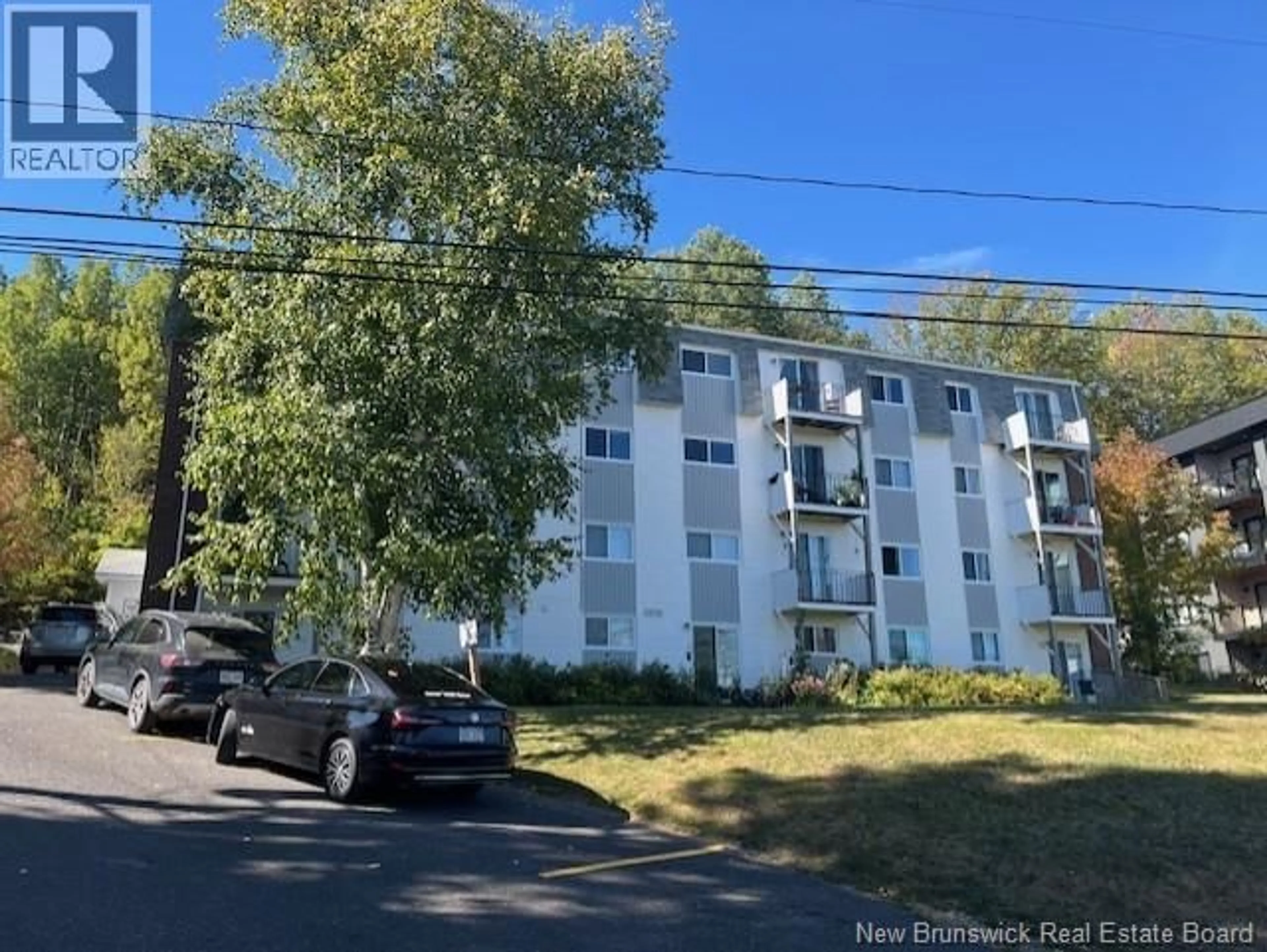 A pic from outside/outdoor area/front of a property/back of a property/a pic from drone, street for 23 - 228 DUNN'S CROSSING ROAD, Fredericton New Brunswick E3B2A6