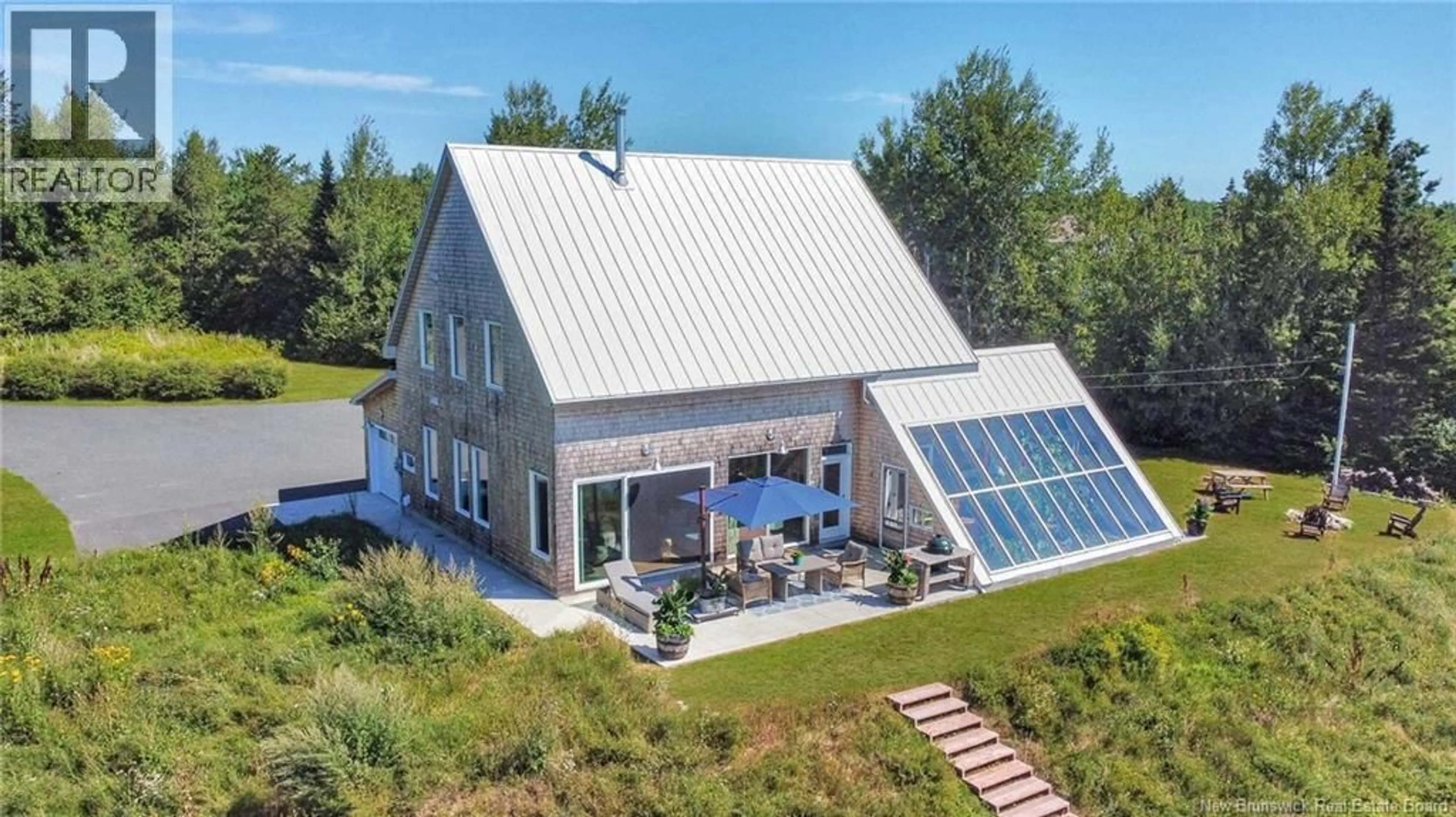 A pic from outside/outdoor area/front of a property/back of a property/a pic from drone, building for 1059 NB-365, Gauvreau New Brunswick E1X2P5