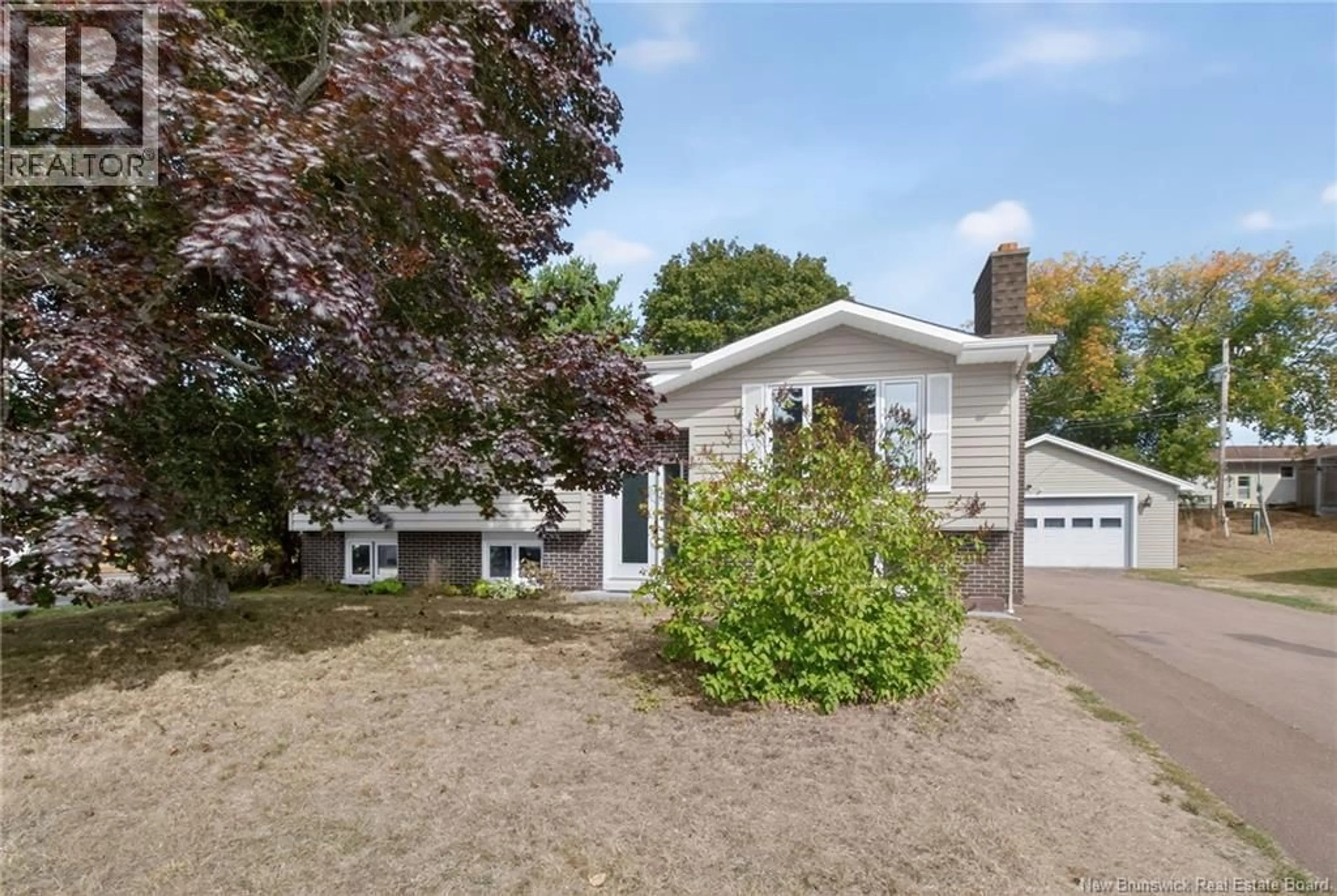 Home with vinyl exterior material, street for 598 GUY, Dieppe New Brunswick E1A4V7