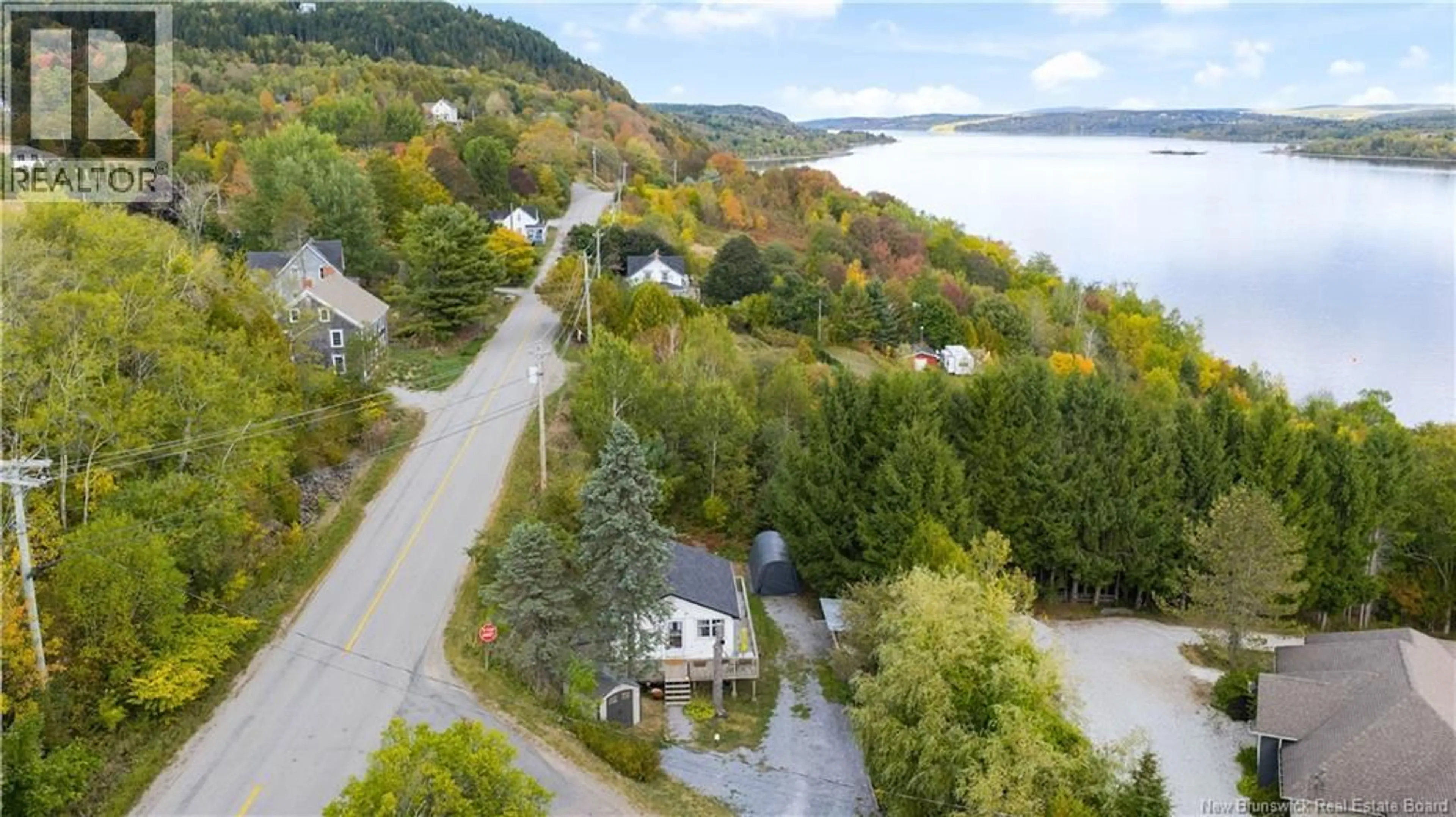 A pic from outside/outdoor area/front of a property/back of a property/a pic from drone, water/lake/river/ocean view for 1 CLIFTON WHARF ROAD, Clifton Royal New Brunswick E5S2B5