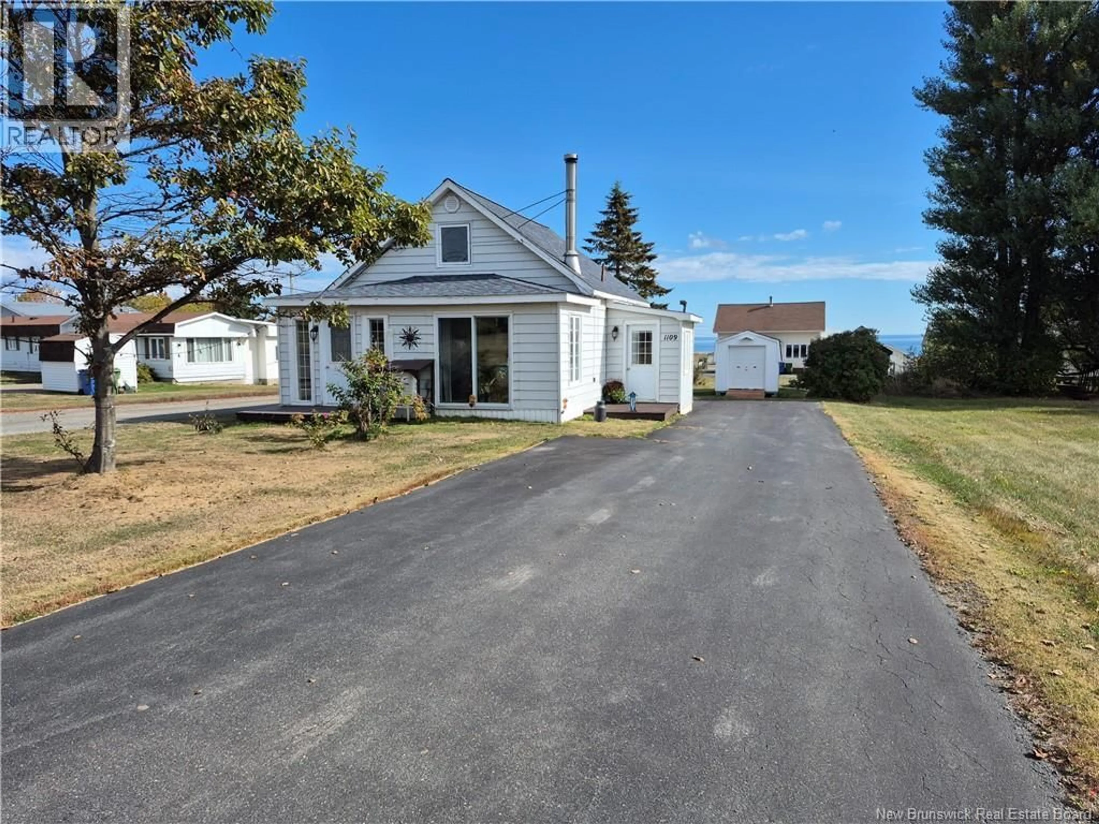 A pic from outside/outdoor area/front of a property/back of a property/a pic from drone, street for 1109 ROUTE 134, Petit-Rocher-Sud New Brunswick E8J1C4