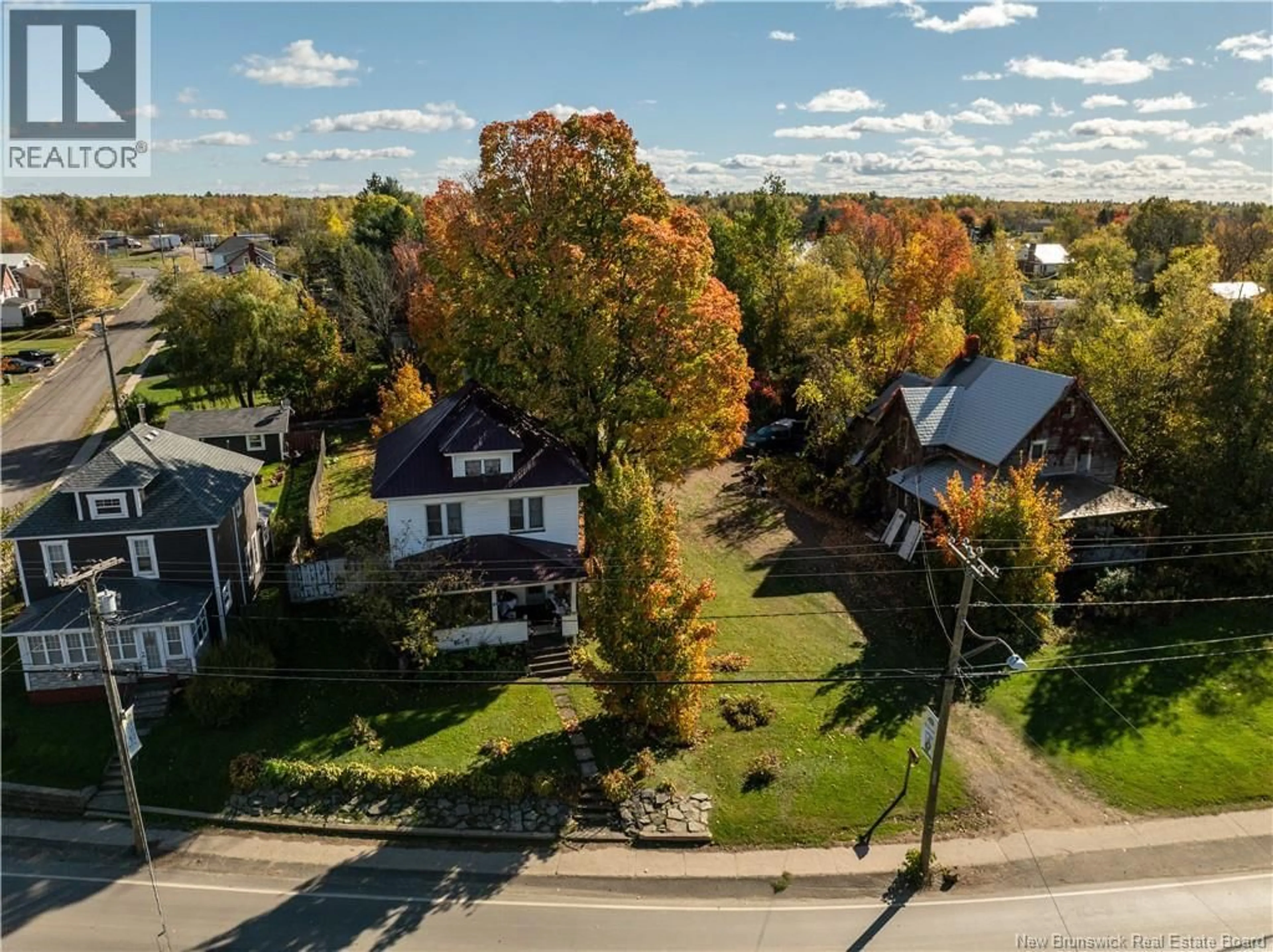 A pic from outside/outdoor area/front of a property/back of a property/a pic from drone, street for 187 MAIN STREET, Chipman New Brunswick E4A1X7