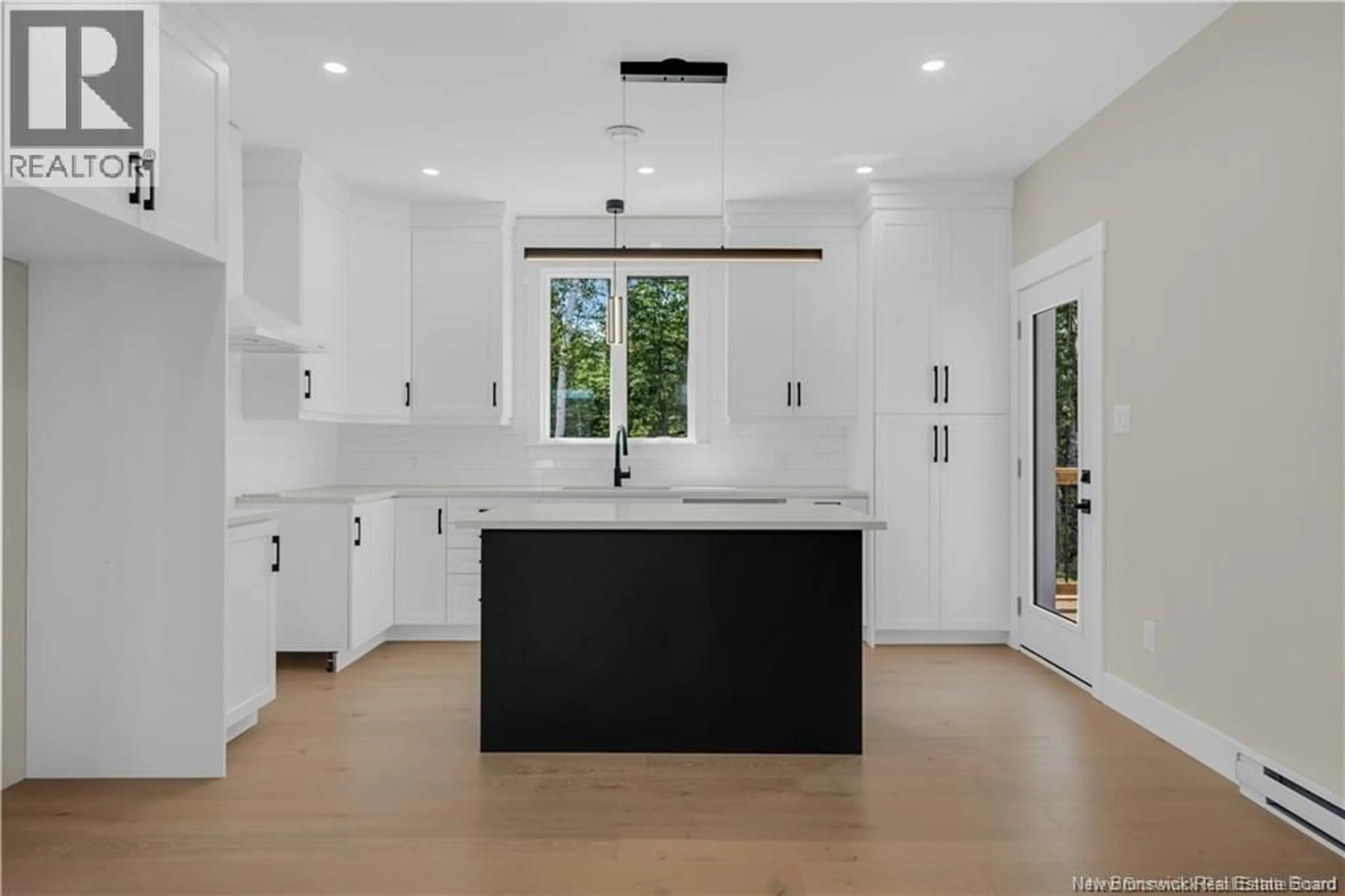 Open concept kitchen, ceramic/tile floor for 81 GUY STREET, Shediac New Brunswick E4P0L5