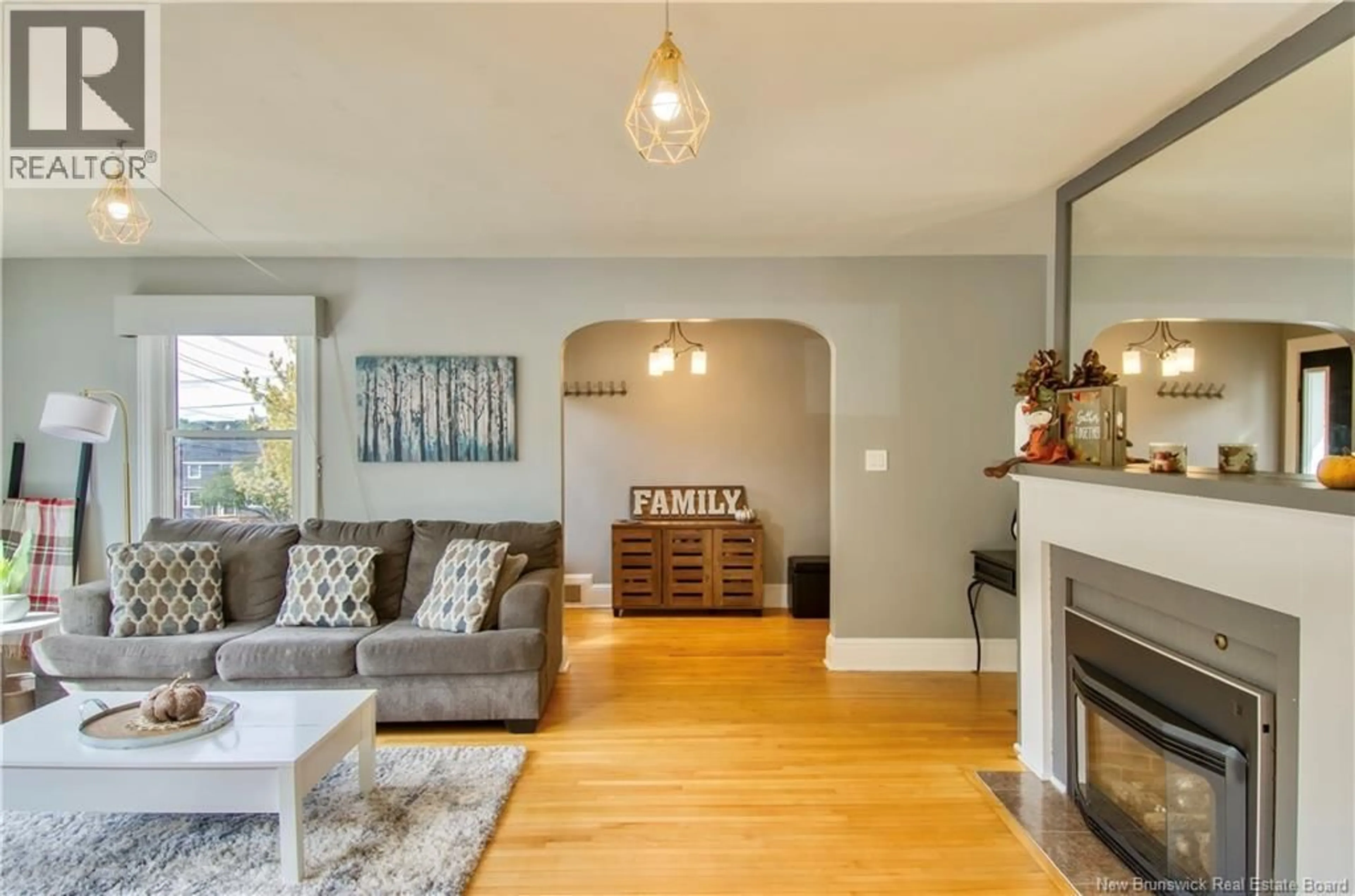 Living room with furniture, wood/laminate floor for 361 YOUNG STREET, Saint John New Brunswick E2M2T9