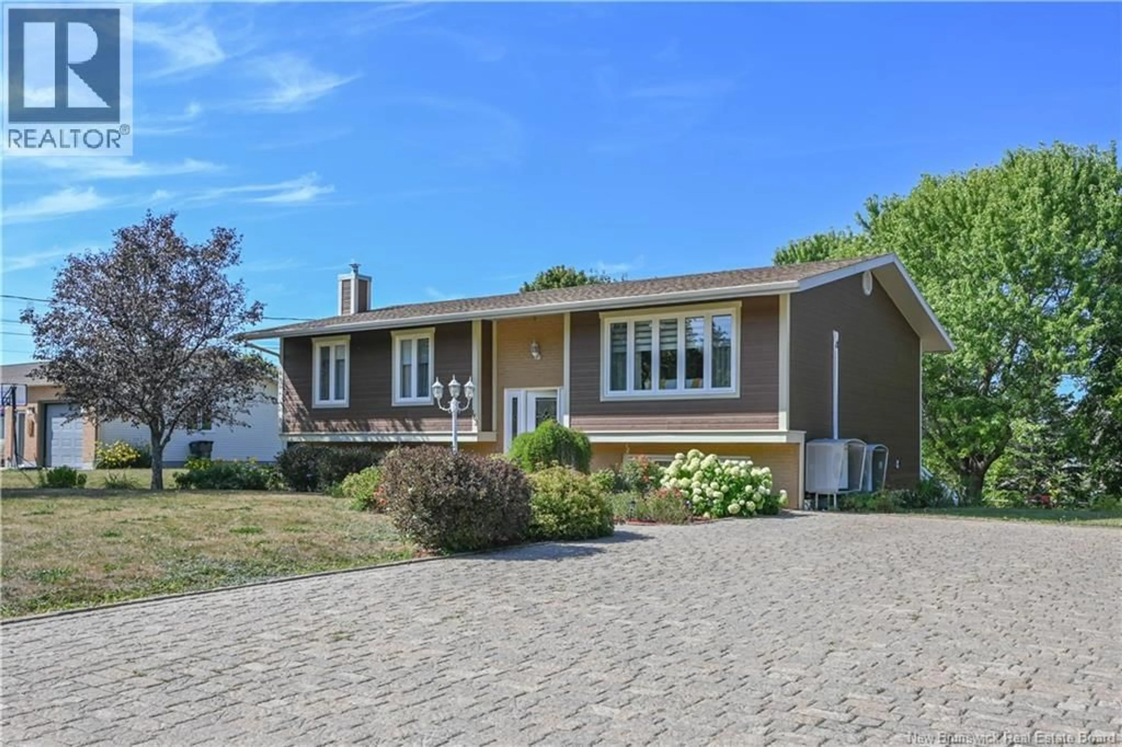 Home with vinyl exterior material, street for 163 GRANDE-ALLÉE LANE, Caraquet New Brunswick E1W1A5