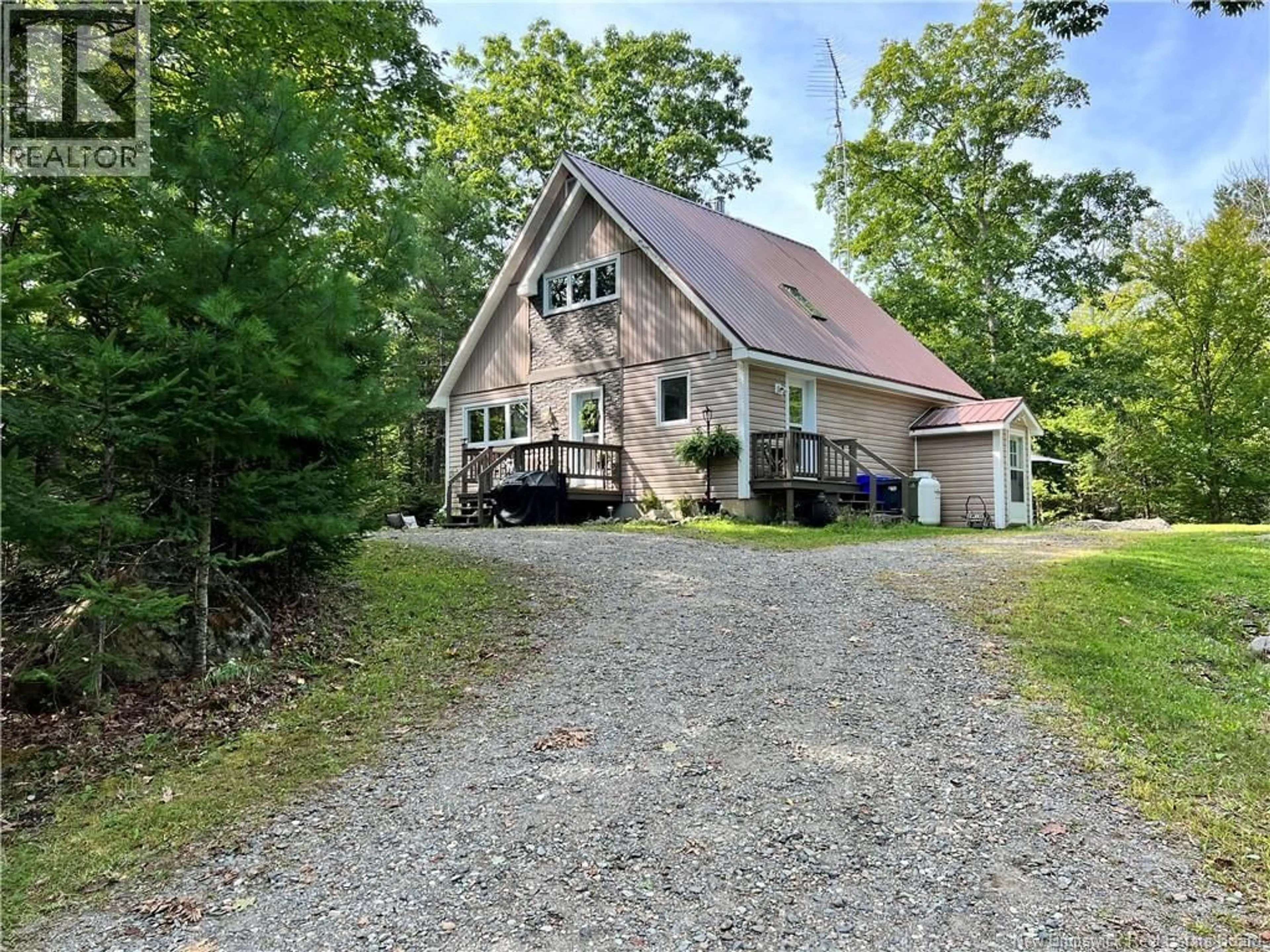 A pic from outside/outdoor area/front of a property/back of a property/a pic from drone, water/lake/river/ocean view for 12 MARKS POINT ROAD, St. Stephen New Brunswick E3L3P8