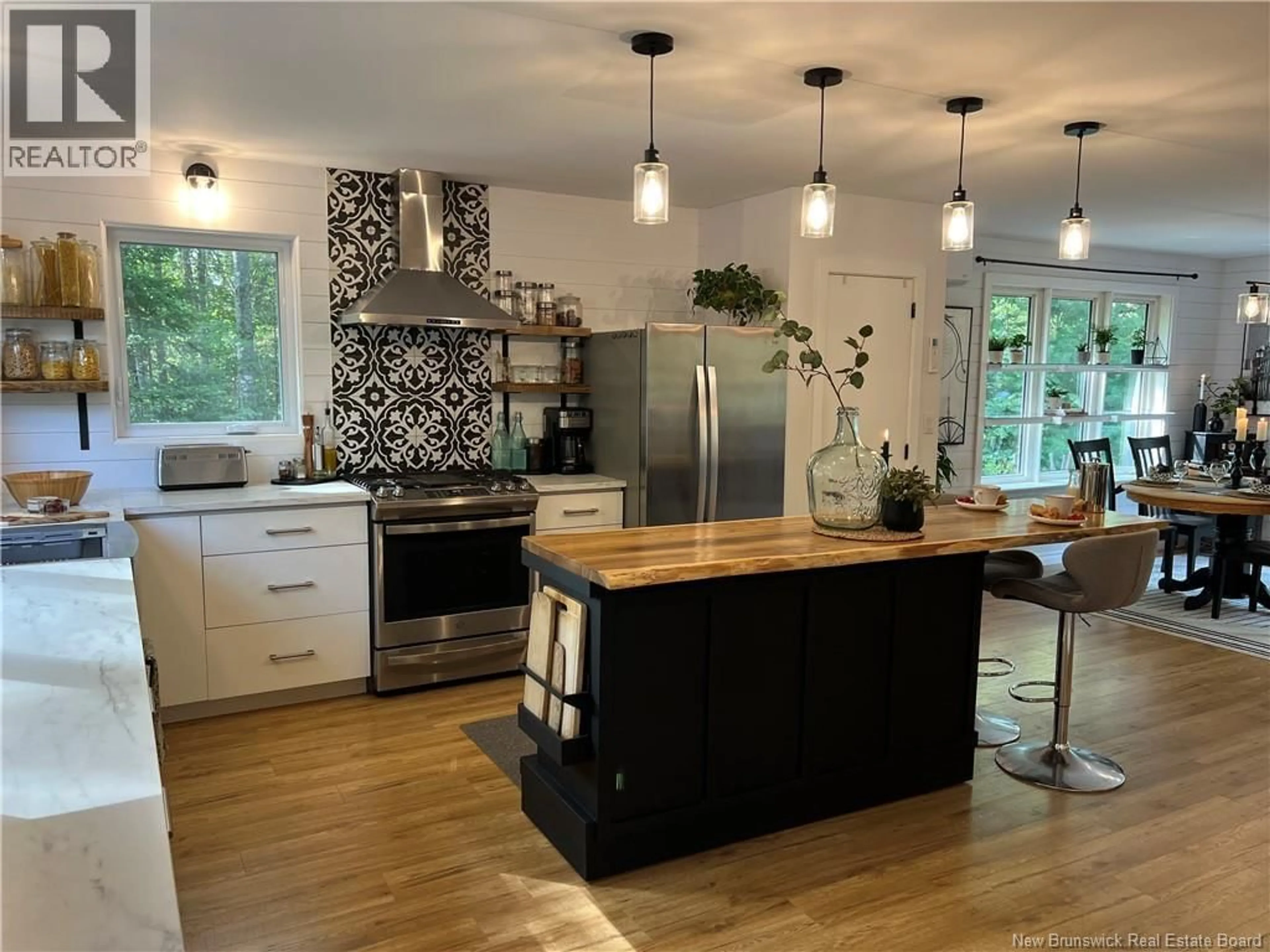 Open concept kitchen, wood/laminate floor for 12 MARKS POINT ROAD, St. Stephen New Brunswick E3L3P8