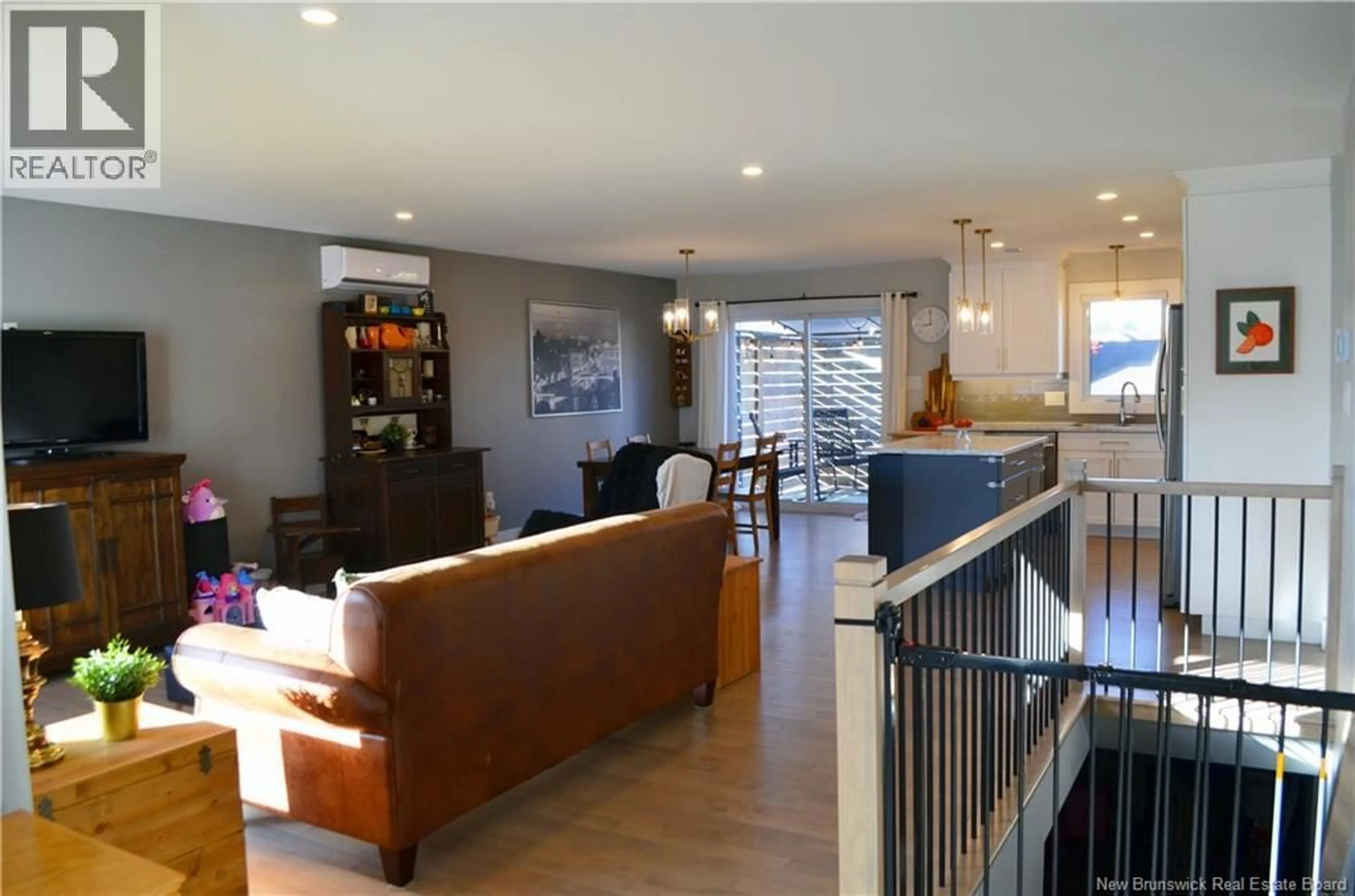 Open concept kitchen, wood/laminate floor for 64 AMITY STREET, Moncton New Brunswick E1G0S3