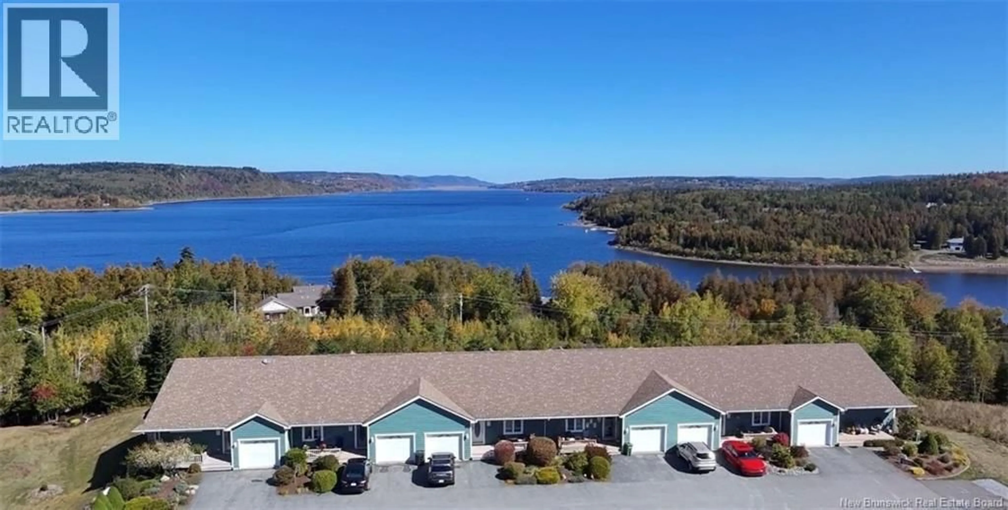 A pic from outside/outdoor area/front of a property/back of a property/a pic from drone, water/lake/river/ocean view for 59 MERRITT HILL ROAD, Quispamsis New Brunswick E2E0C5
