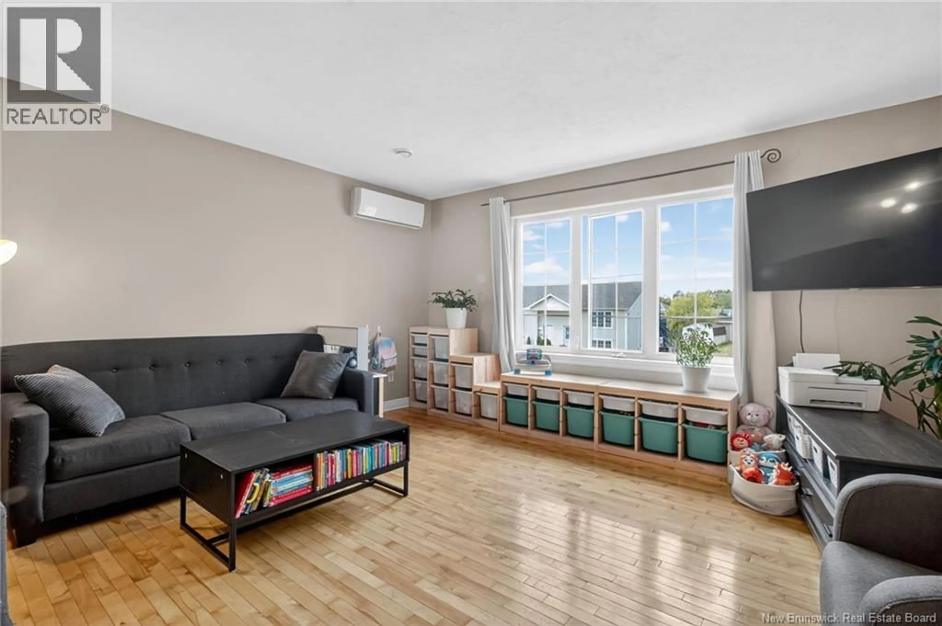 Living room with furniture, unknown for 17 DANUBE COURT, Dieppe New Brunswick E1A8G6