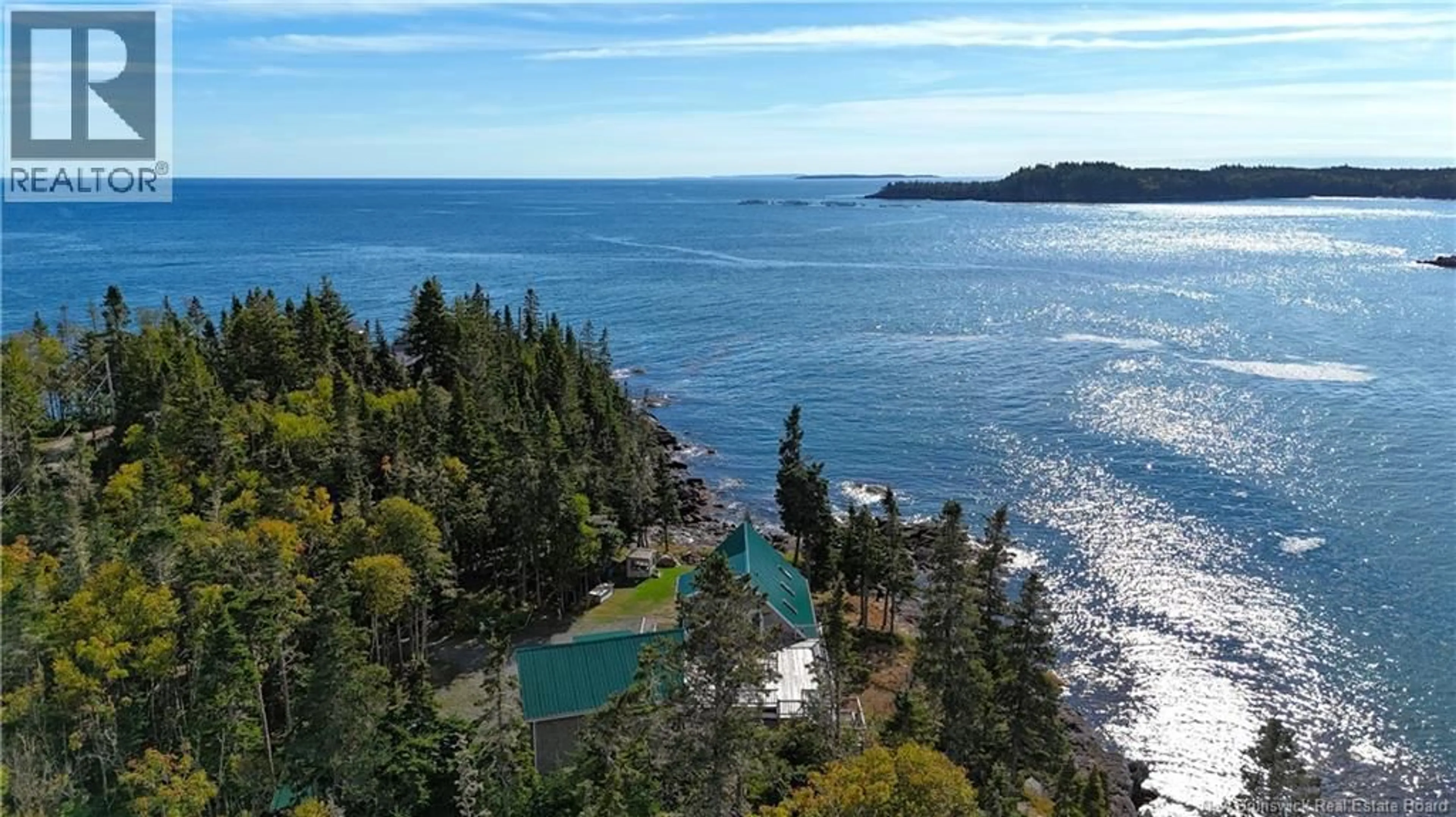 A pic from outside/outdoor area/front of a property/back of a property/a pic from drone, water/lake/river/ocean view for 82 HOLLAND ROAD, Seeleys Cove New Brunswick H4A2R7