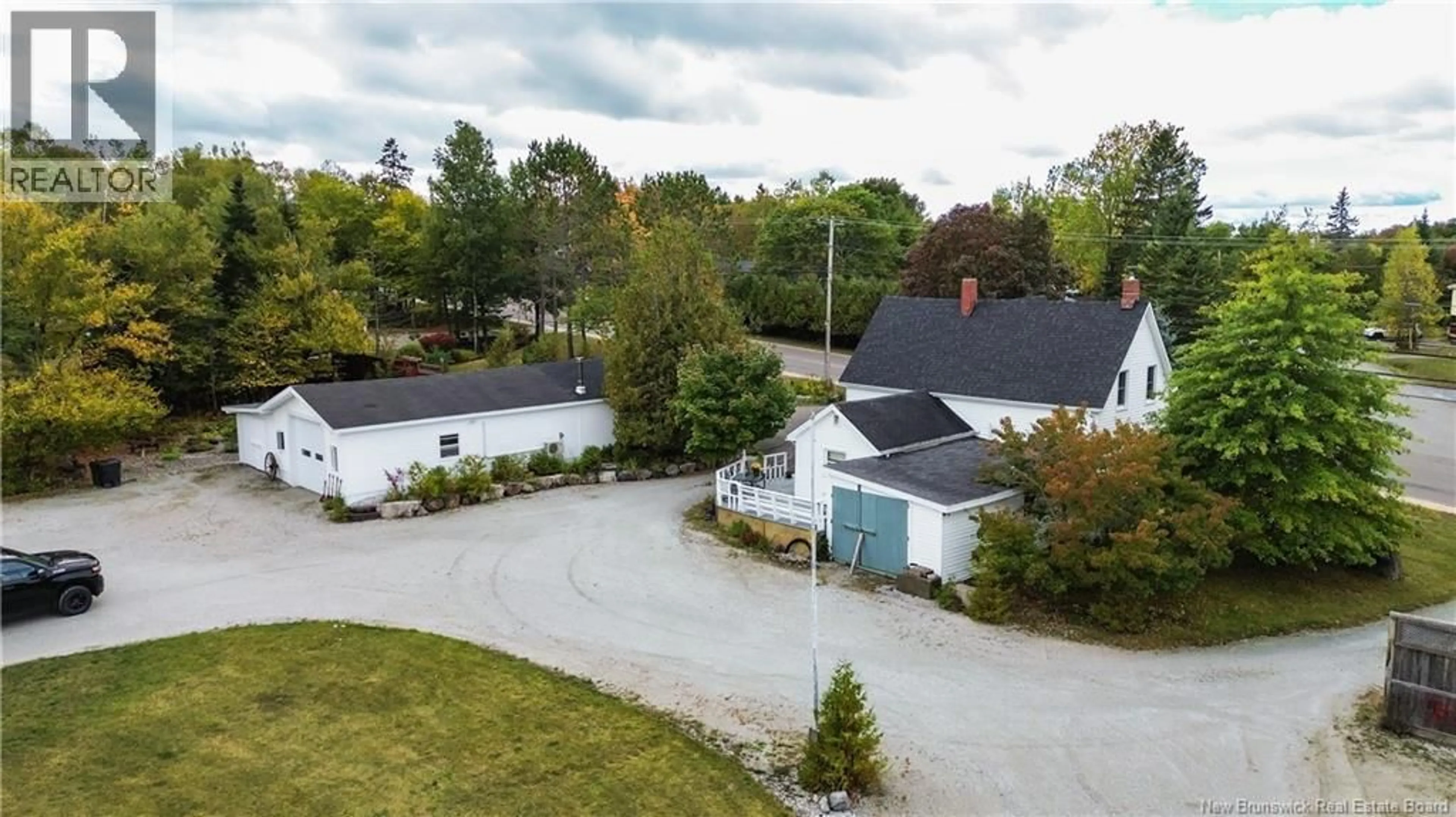 A pic from outside/outdoor area/front of a property/back of a property/a pic from drone, street for 416 HAMPTON ROAD, Quispamsis New Brunswick E2E4V5