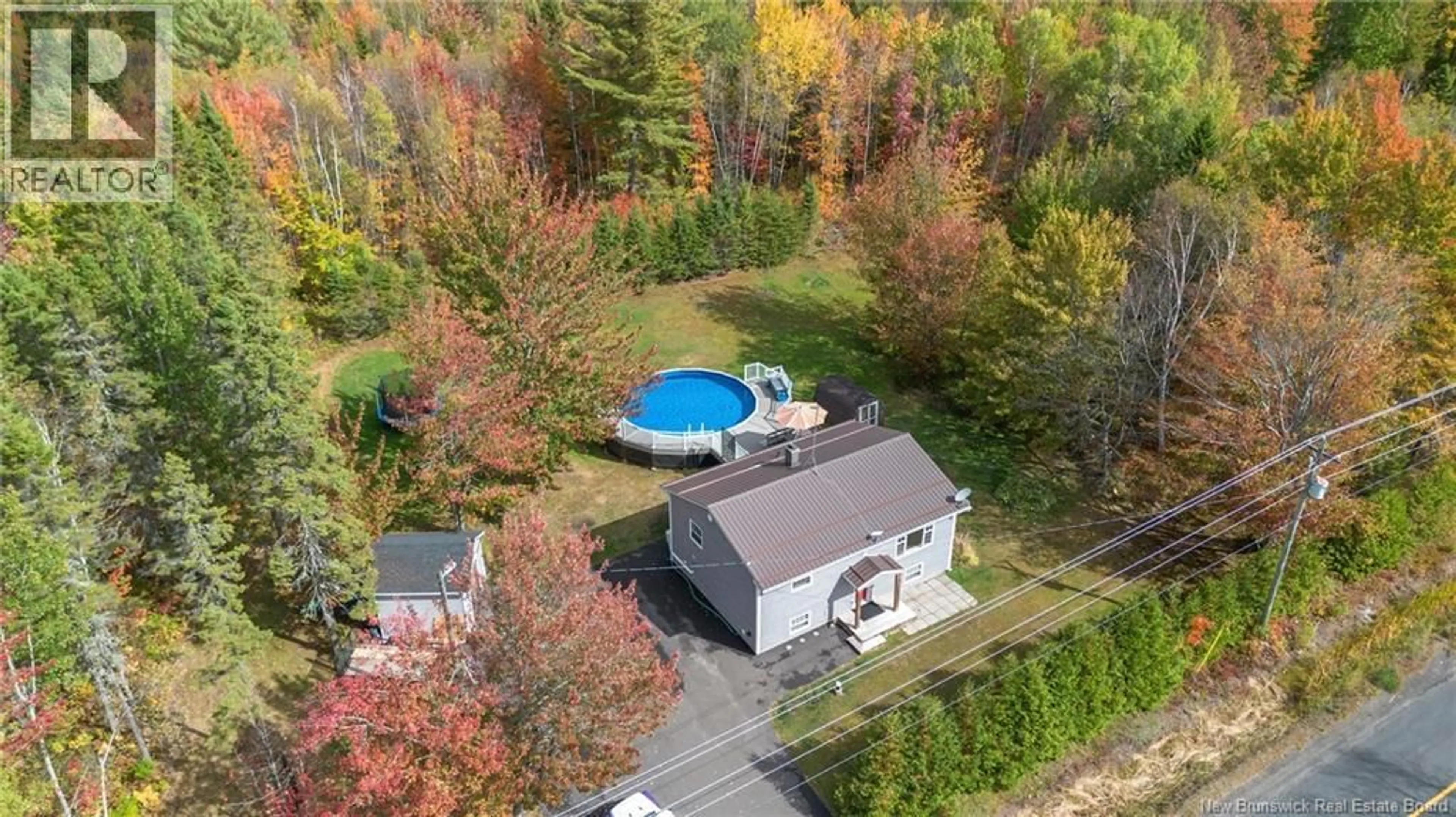 A pic from outside/outdoor area/front of a property/back of a property/a pic from drone, water/lake/river/ocean view for 249 EVANS ROAD, Minto New Brunswick E4B2S2