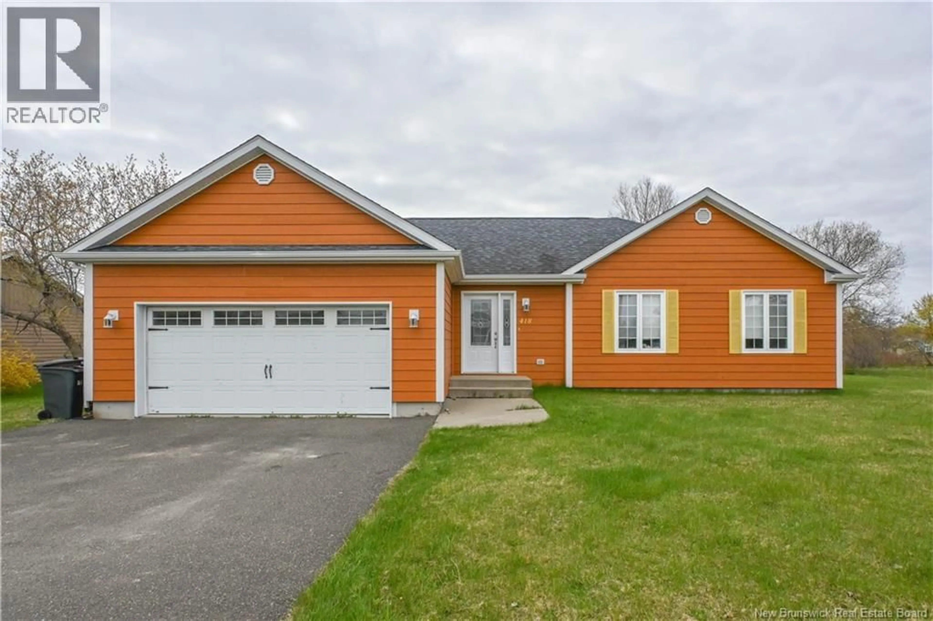 Home with vinyl exterior material, street for 418 WADE STREET, Tracadie New Brunswick E1X1E2