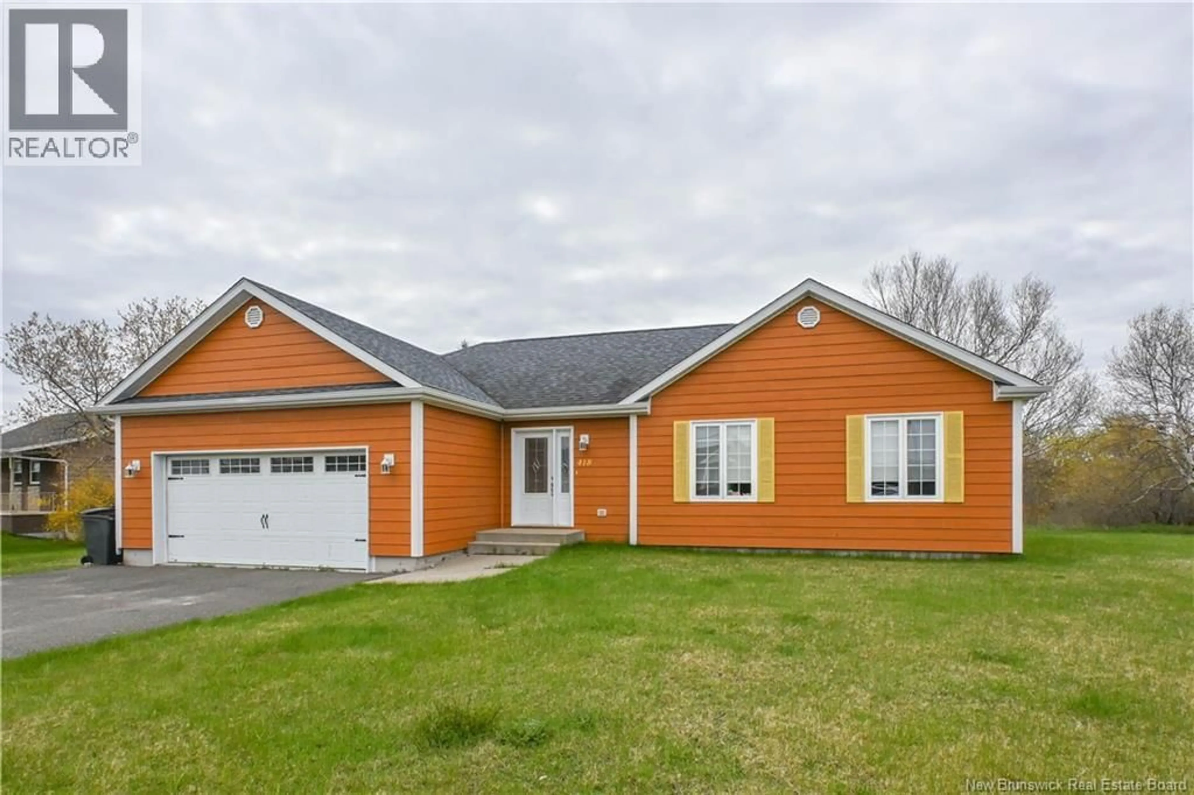 Home with vinyl exterior material, street for 418 WADE STREET, Tracadie New Brunswick E1X1E2