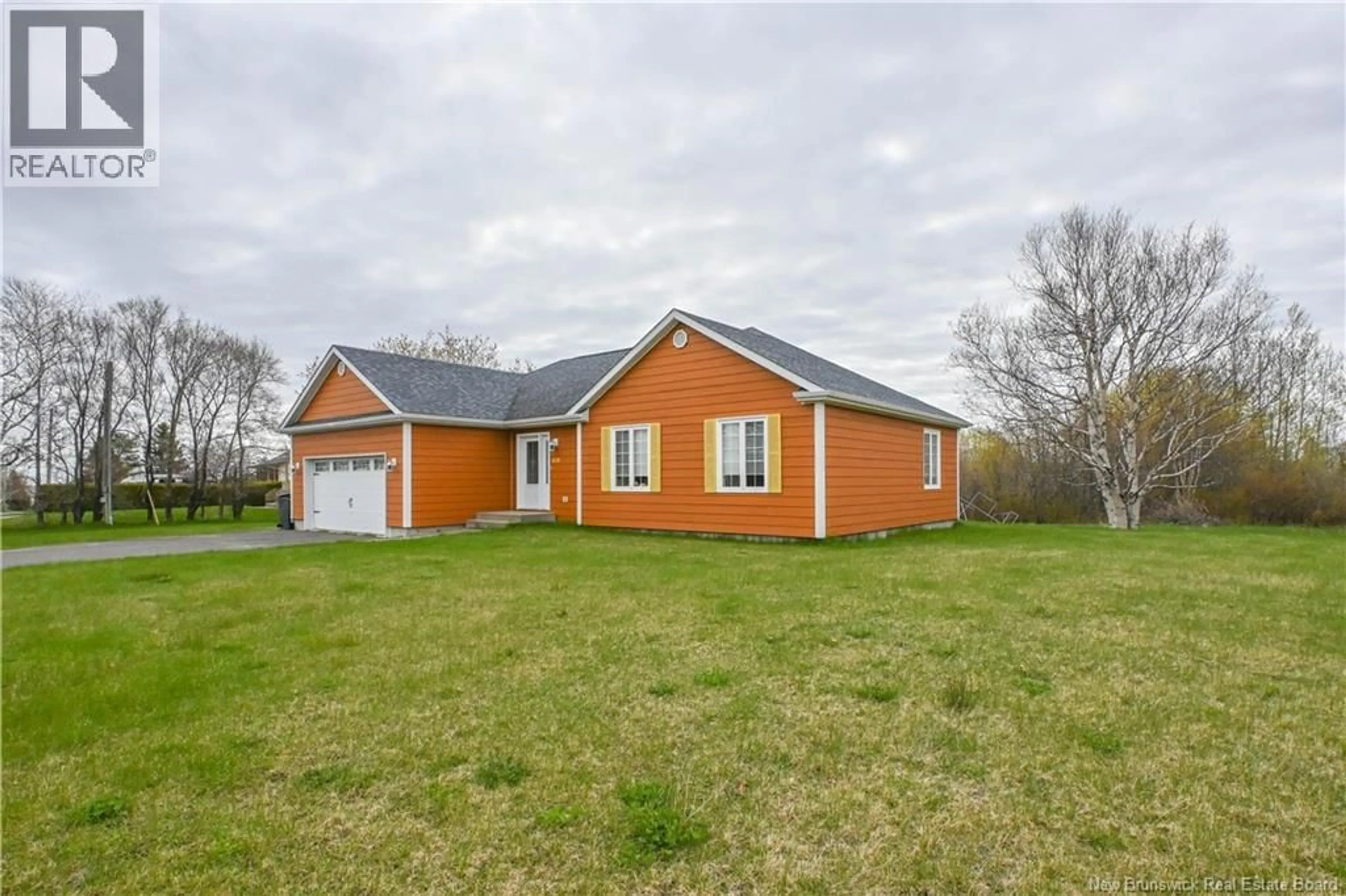 A pic from outside/outdoor area/front of a property/back of a property/a pic from drone, street for 418 WADE STREET, Tracadie New Brunswick E1X1E2
