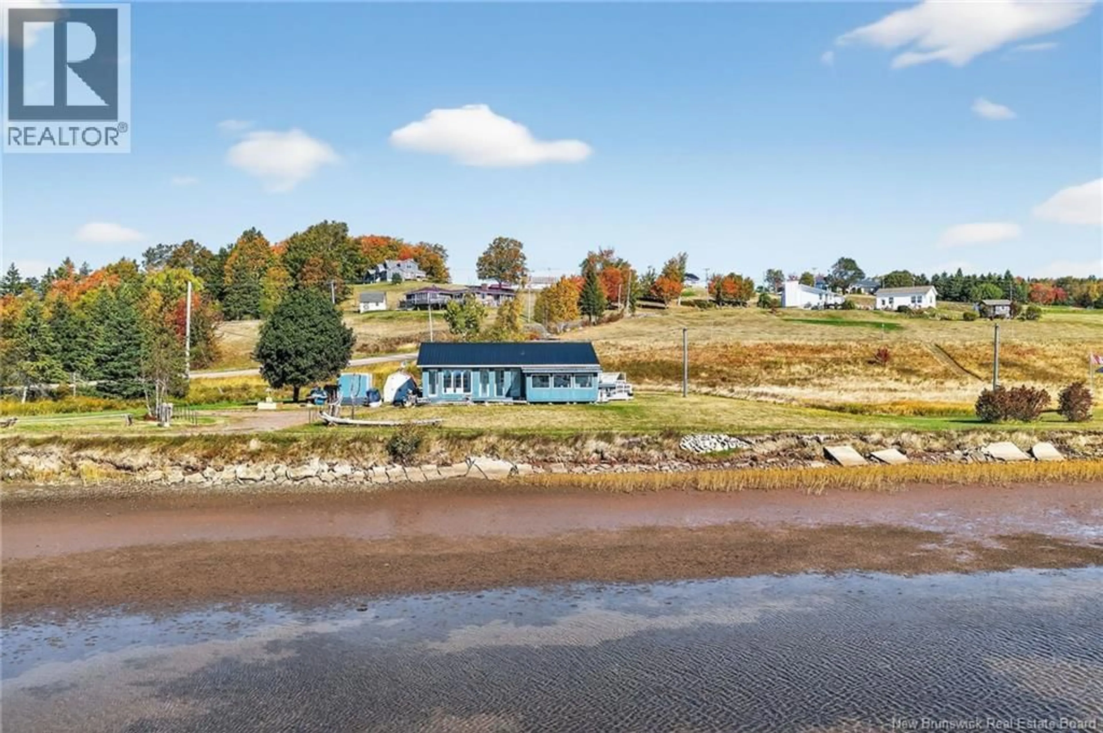A pic from outside/outdoor area/front of a property/back of a property/a pic from drone, water/lake/river/ocean view for 11411 ROUTE 515, Bouctouche Cove New Brunswick E4S4J5