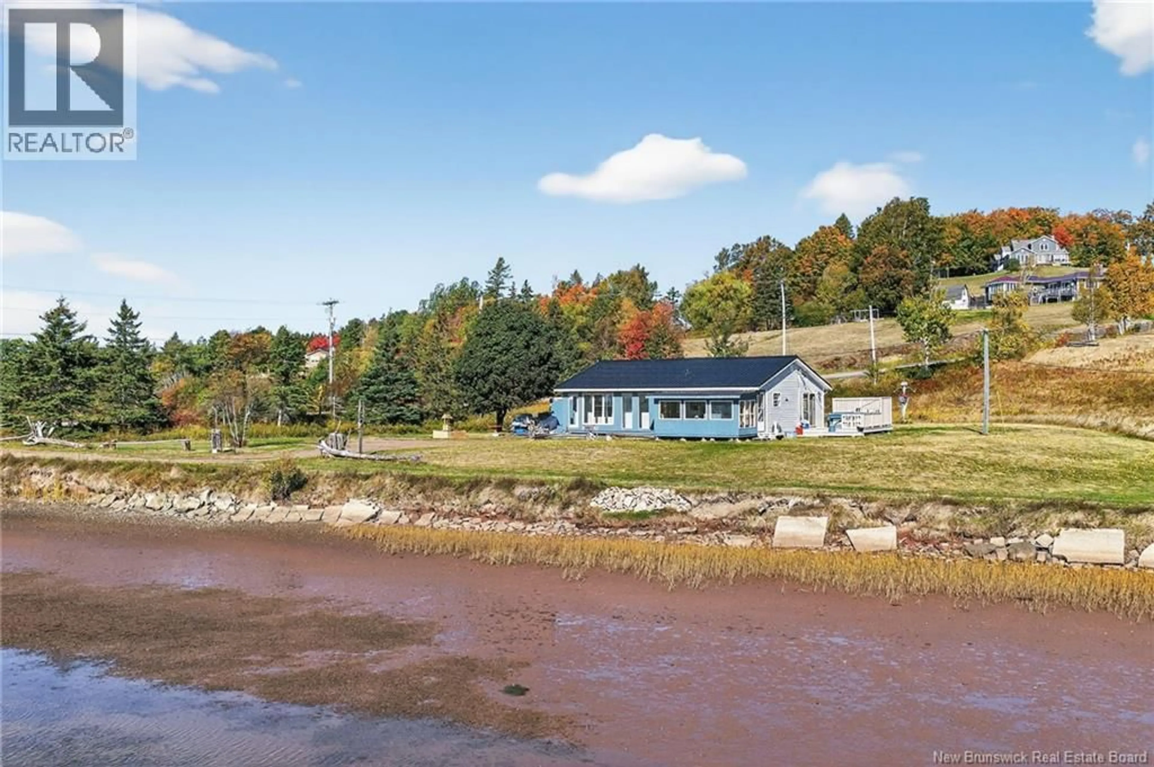 A pic from outside/outdoor area/front of a property/back of a property/a pic from drone, water/lake/river/ocean view for 11411 ROUTE 515, Bouctouche Cove New Brunswick E4S4J5