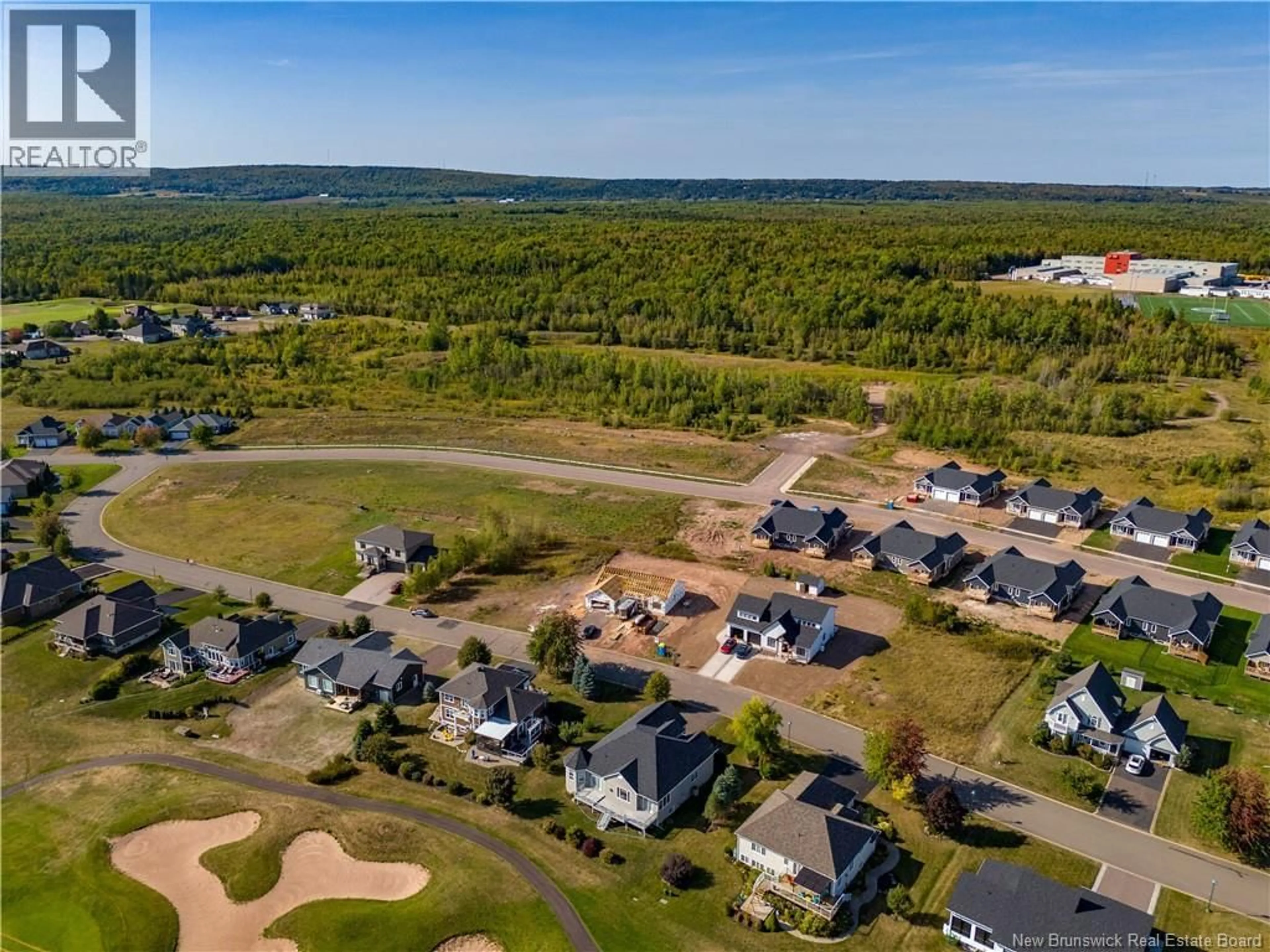 A pic from outside/outdoor area/front of a property/back of a property/a pic from drone, water/lake/river/ocean view for 57 KERVIN CRESCENT, Moncton New Brunswick E1H3L4