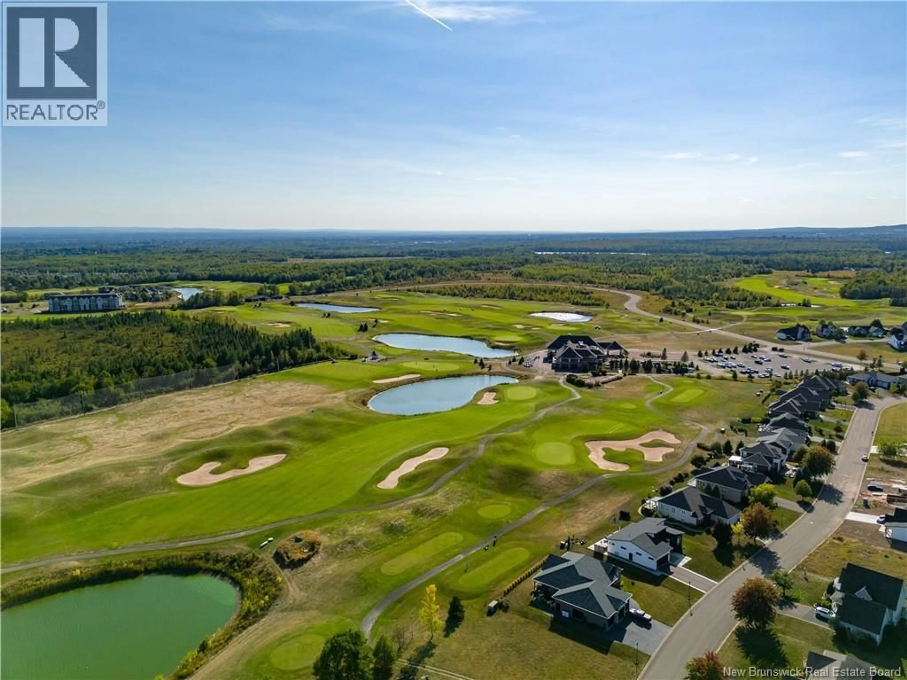 A pic from outside/outdoor area/front of a property/back of a property/a pic from drone, water/lake/river/ocean view for 57 KERVIN CRESCENT, Moncton New Brunswick E1H3L4
