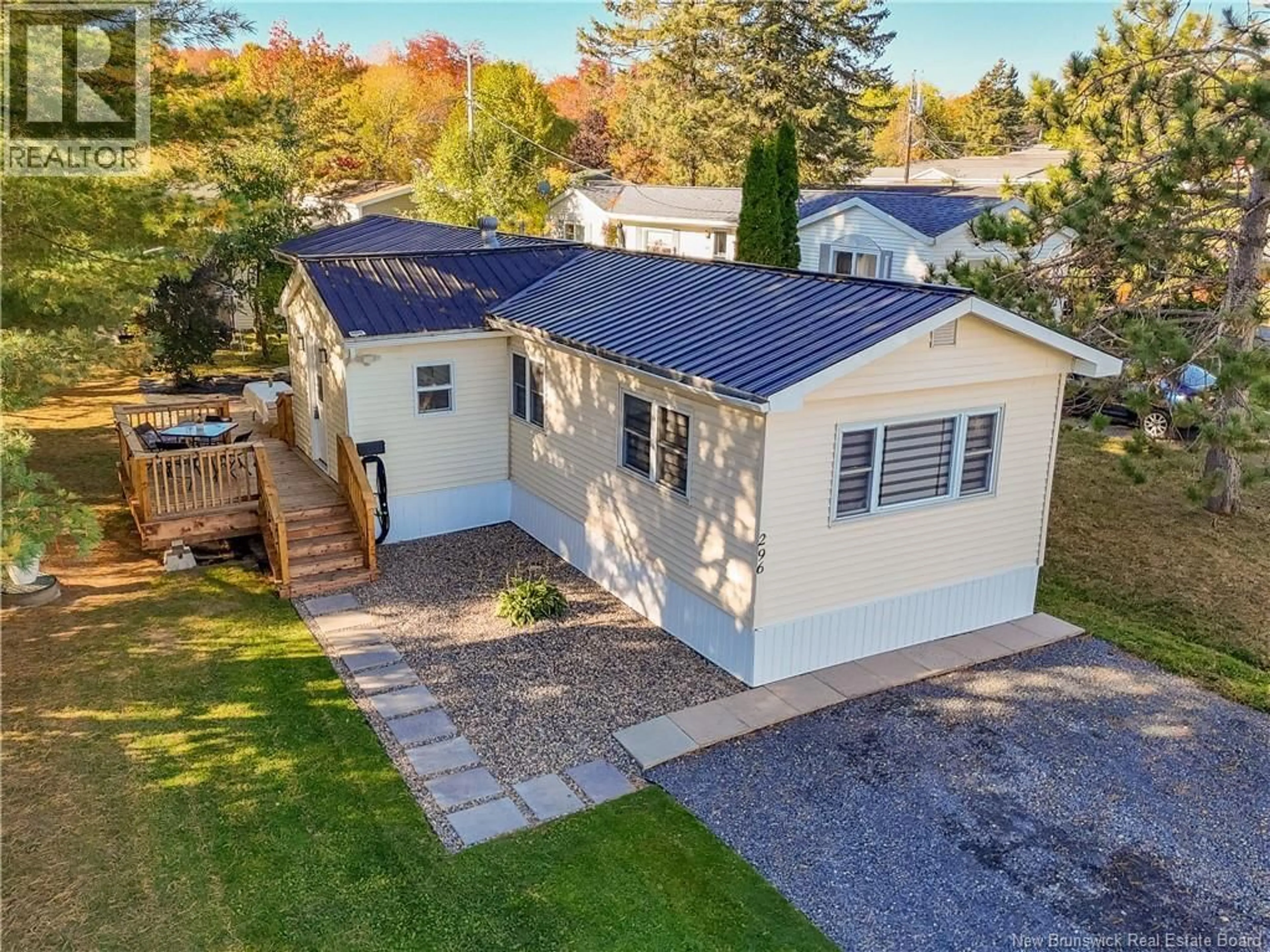 A pic from outside/outdoor area/front of a property/back of a property/a pic from drone, street for 296 MAGNOLIA LANE, Fredericton New Brunswick E3B7P4