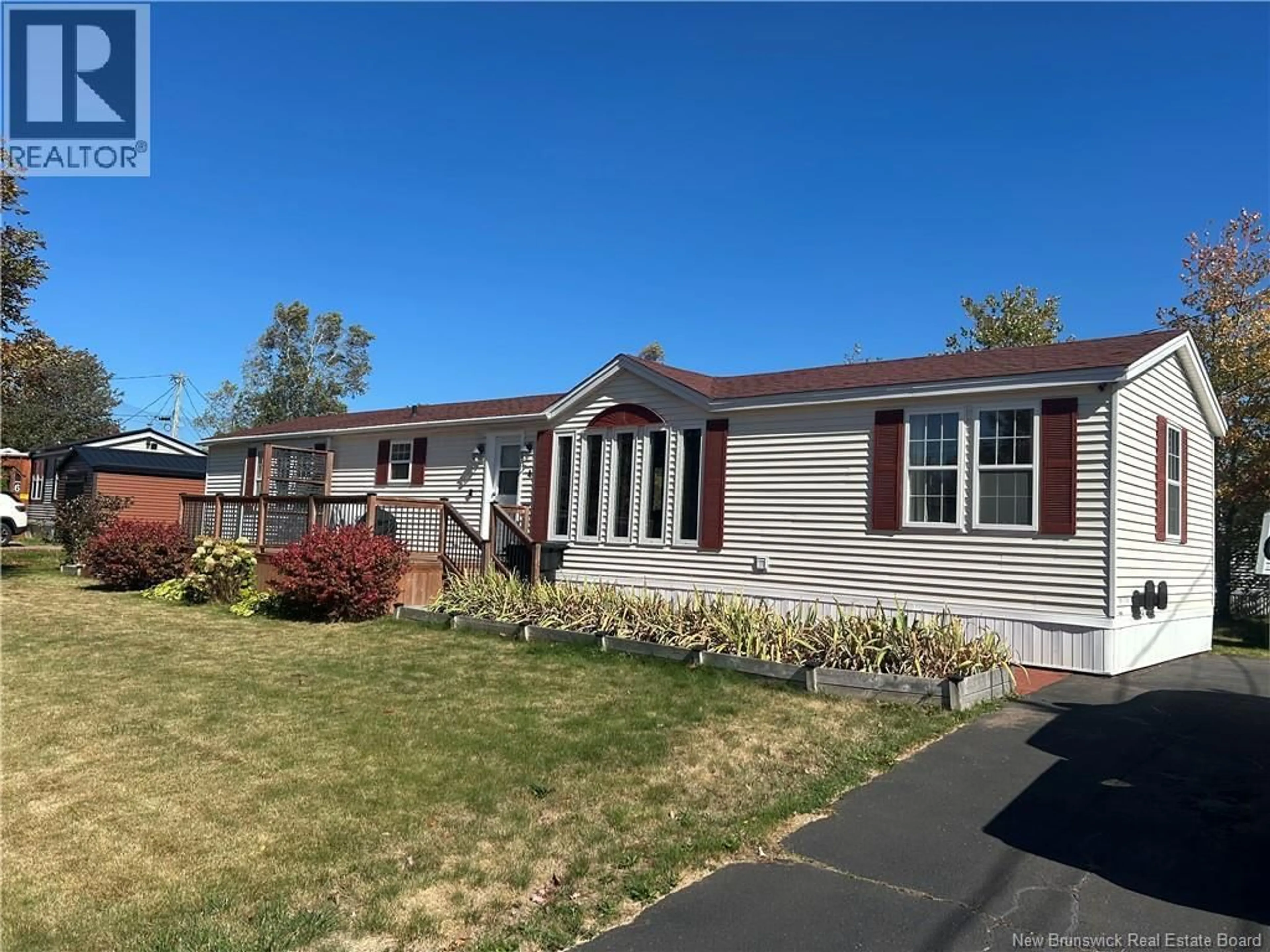 Home with vinyl exterior material, street for 4 CHICKADEE STREET, Moncton New Brunswick E1H2V3