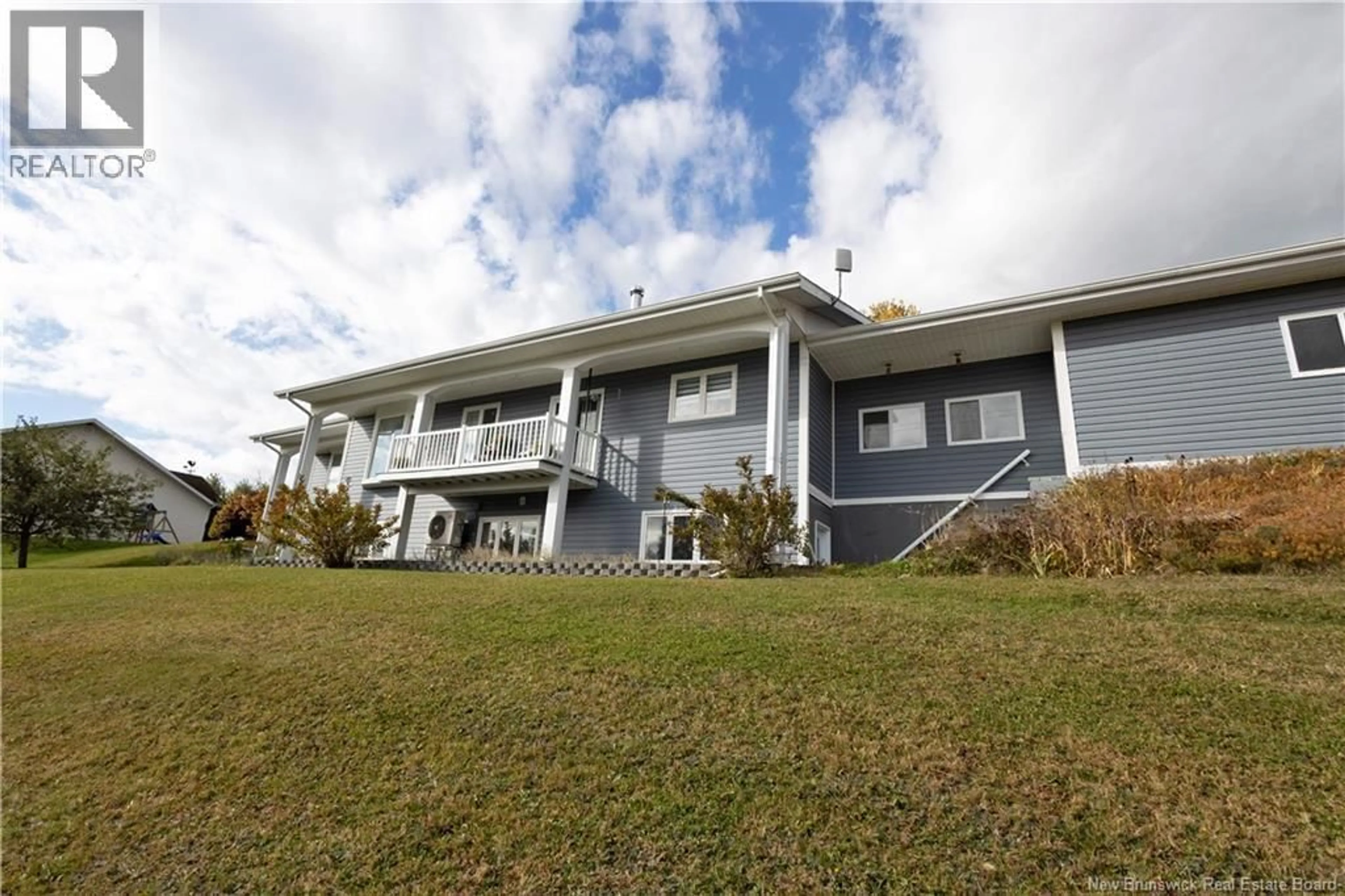 A pic from outside/outdoor area/front of a property/back of a property/a pic from drone, water/lake/river/ocean view for 26 FIRST AVENUE, Plaster Rock New Brunswick E7G1N4