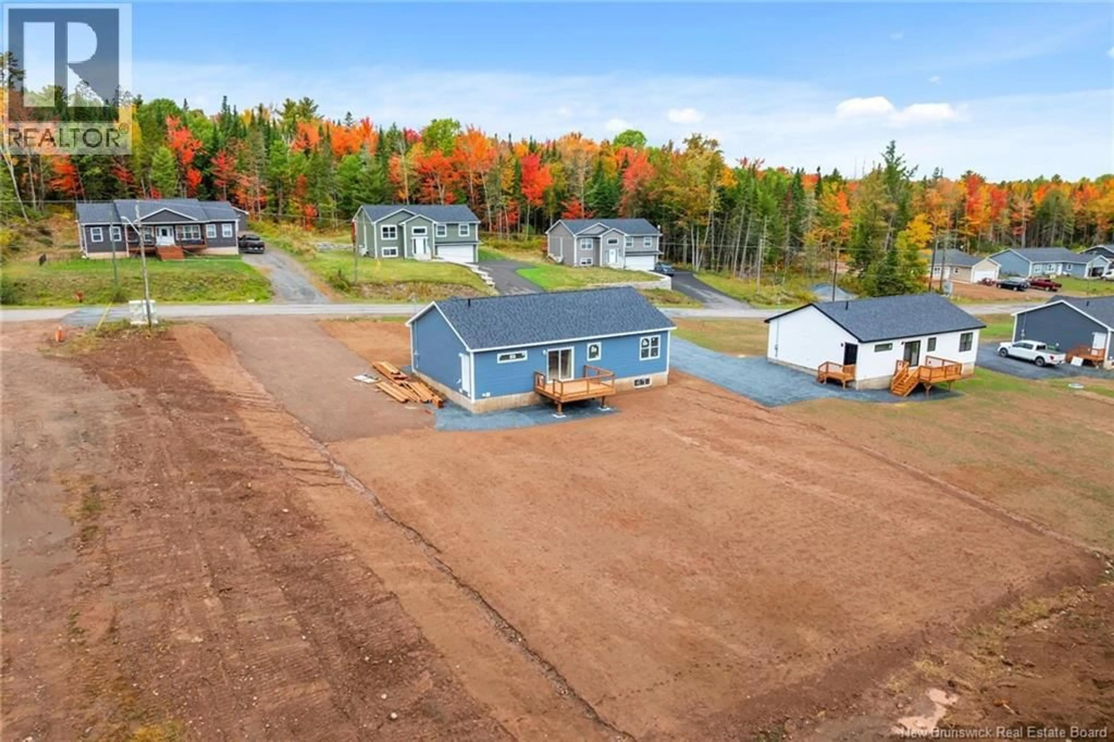 A pic from outside/outdoor area/front of a property/back of a property/a pic from drone, unknown for 124 HORSEMAN ROAD, Fredericton Junction New Brunswick E5L1W5