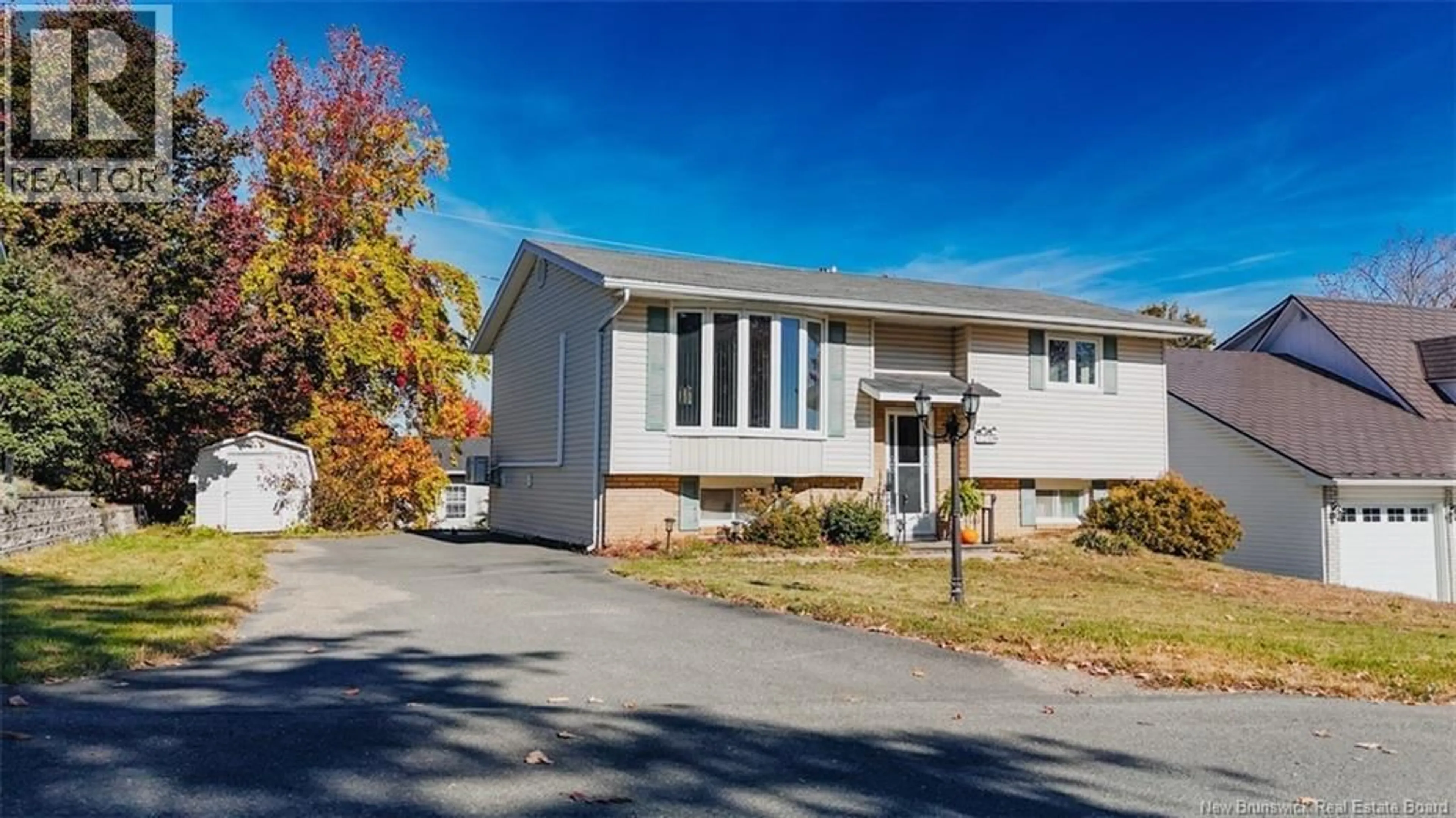 Home with vinyl exterior material, street for 120 WILSON STREET, Woodstock New Brunswick E7M3A3