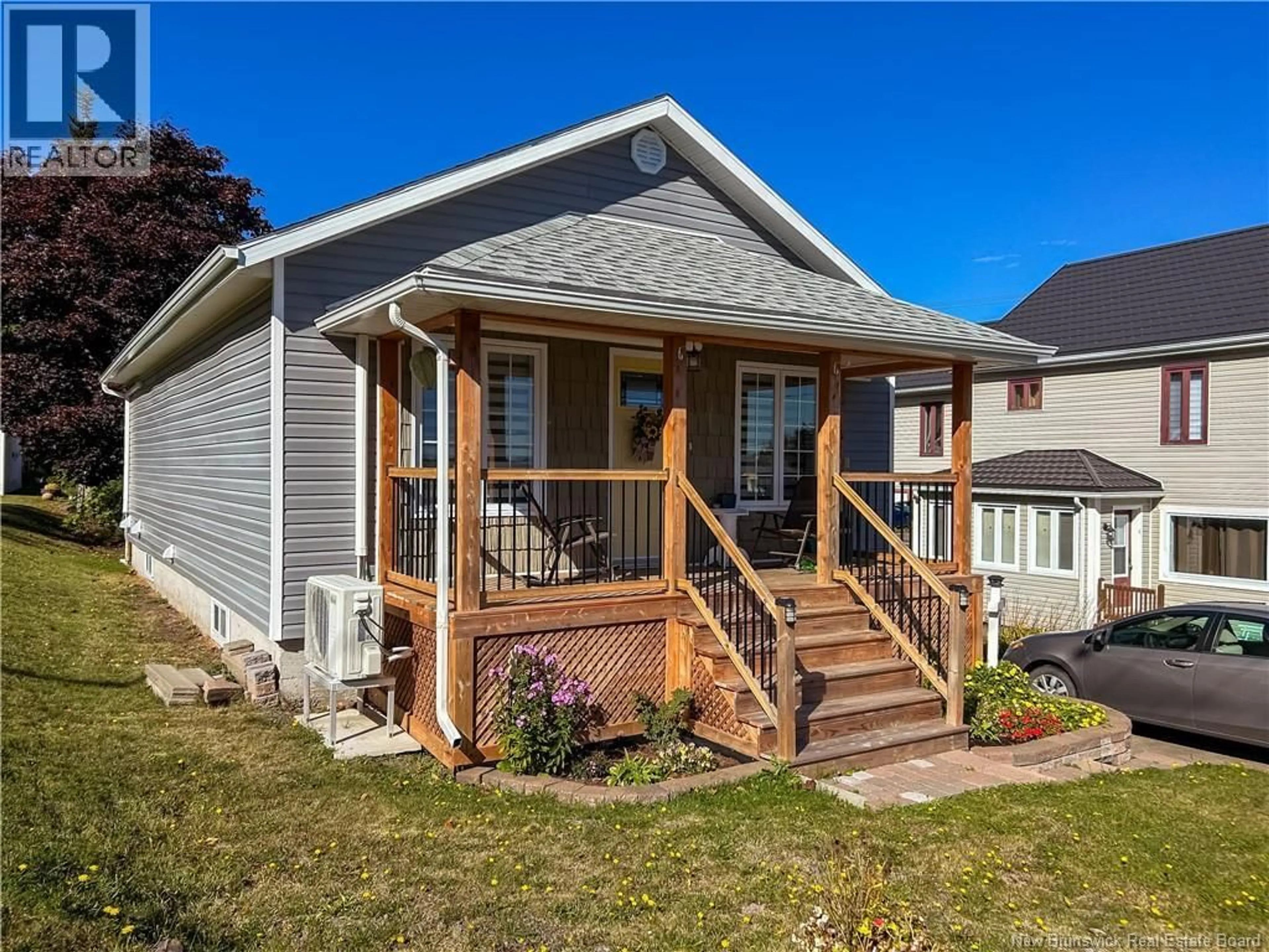 Home with vinyl exterior material, street for 126 SYDNEY STREET, Dalhousie New Brunswick E8C2M7