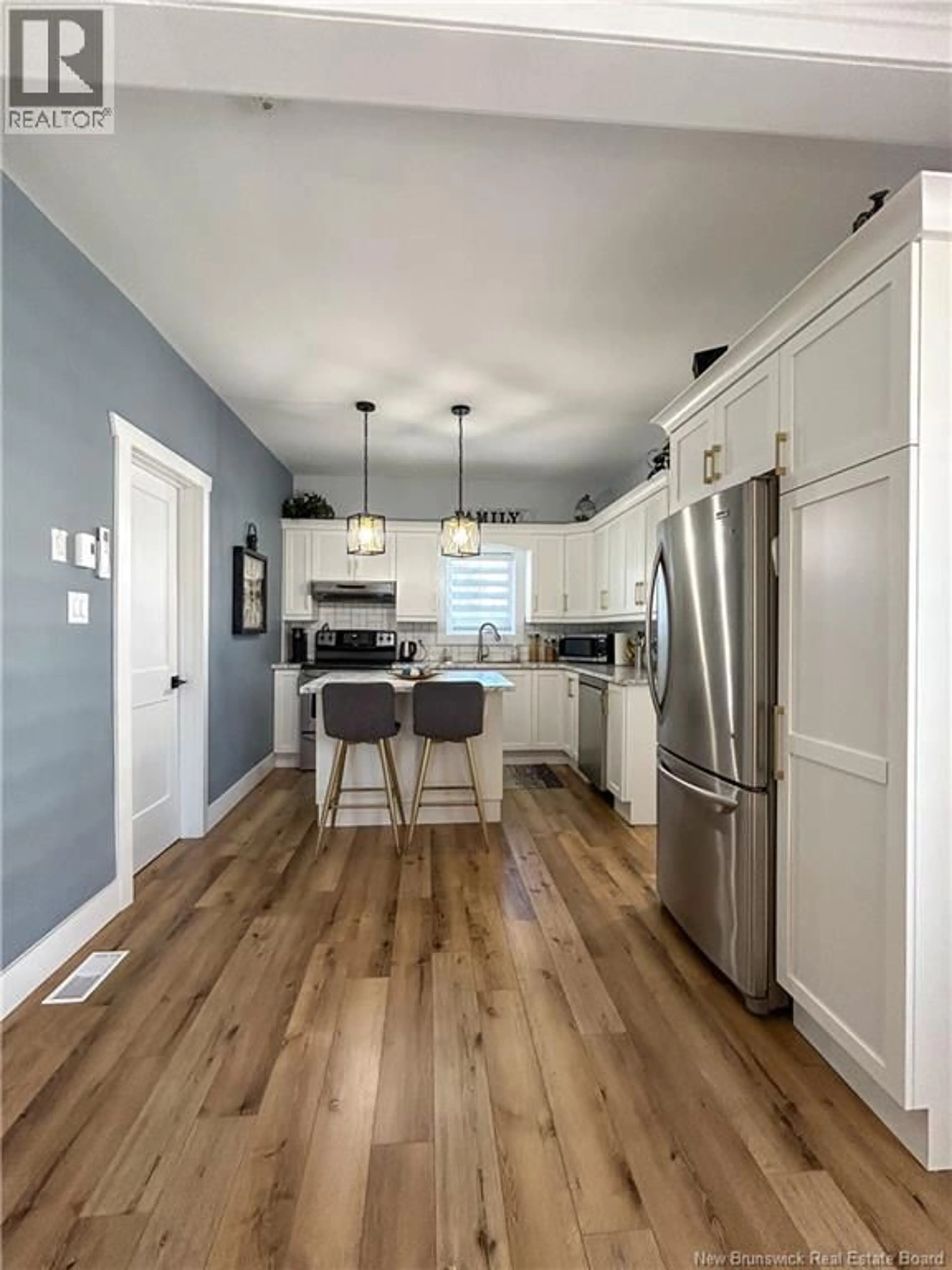 Open concept kitchen, wood/laminate floor for 126 SYDNEY STREET, Dalhousie New Brunswick E8C2M7