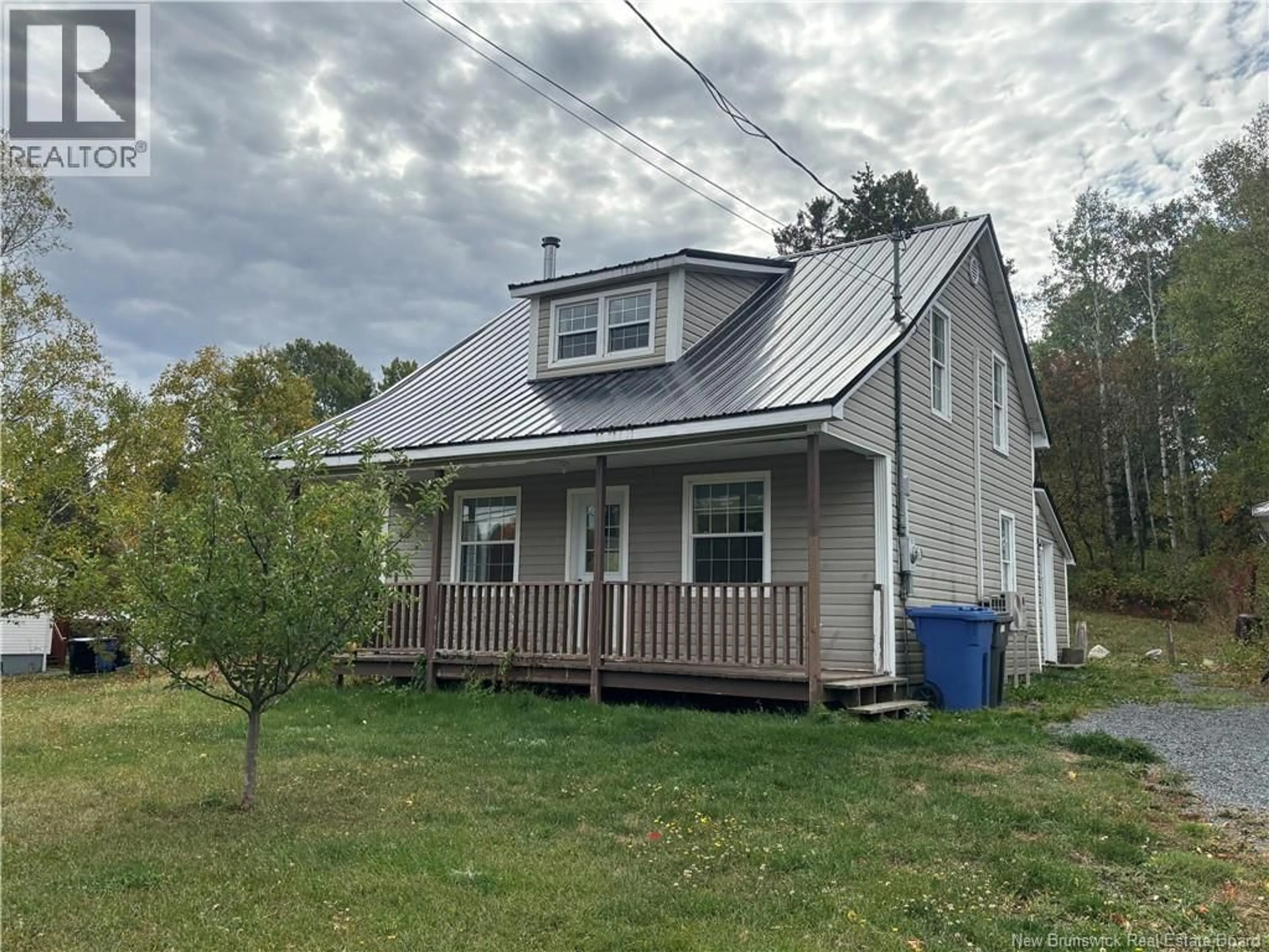 Home with vinyl exterior material, street for 1233 ROUTE 322, Robertville New Brunswick E8K2P5