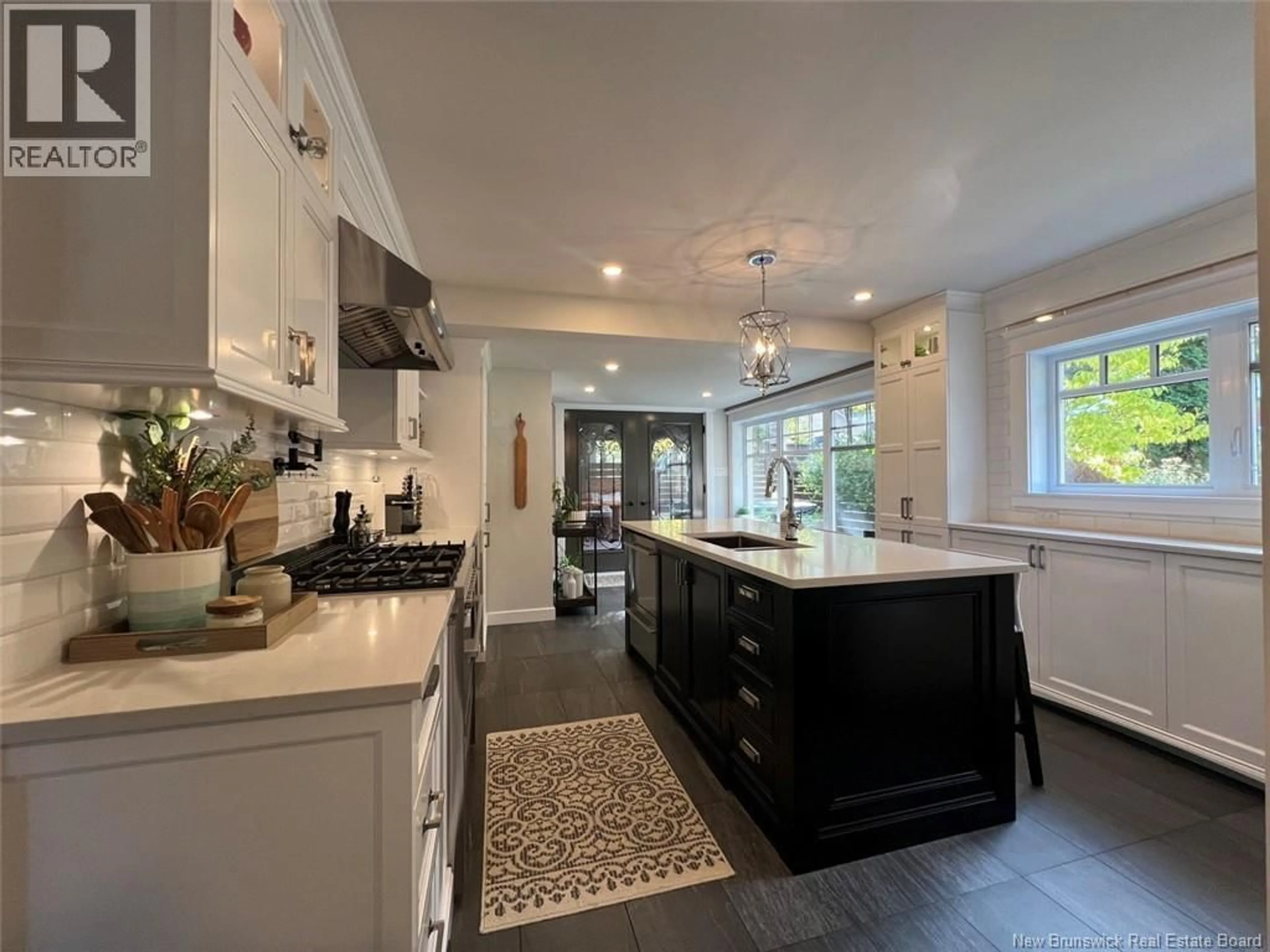 Open concept kitchen, ceramic/tile floor for 24 BURPEE STREET, Edmundston New Brunswick E3V1Z5
