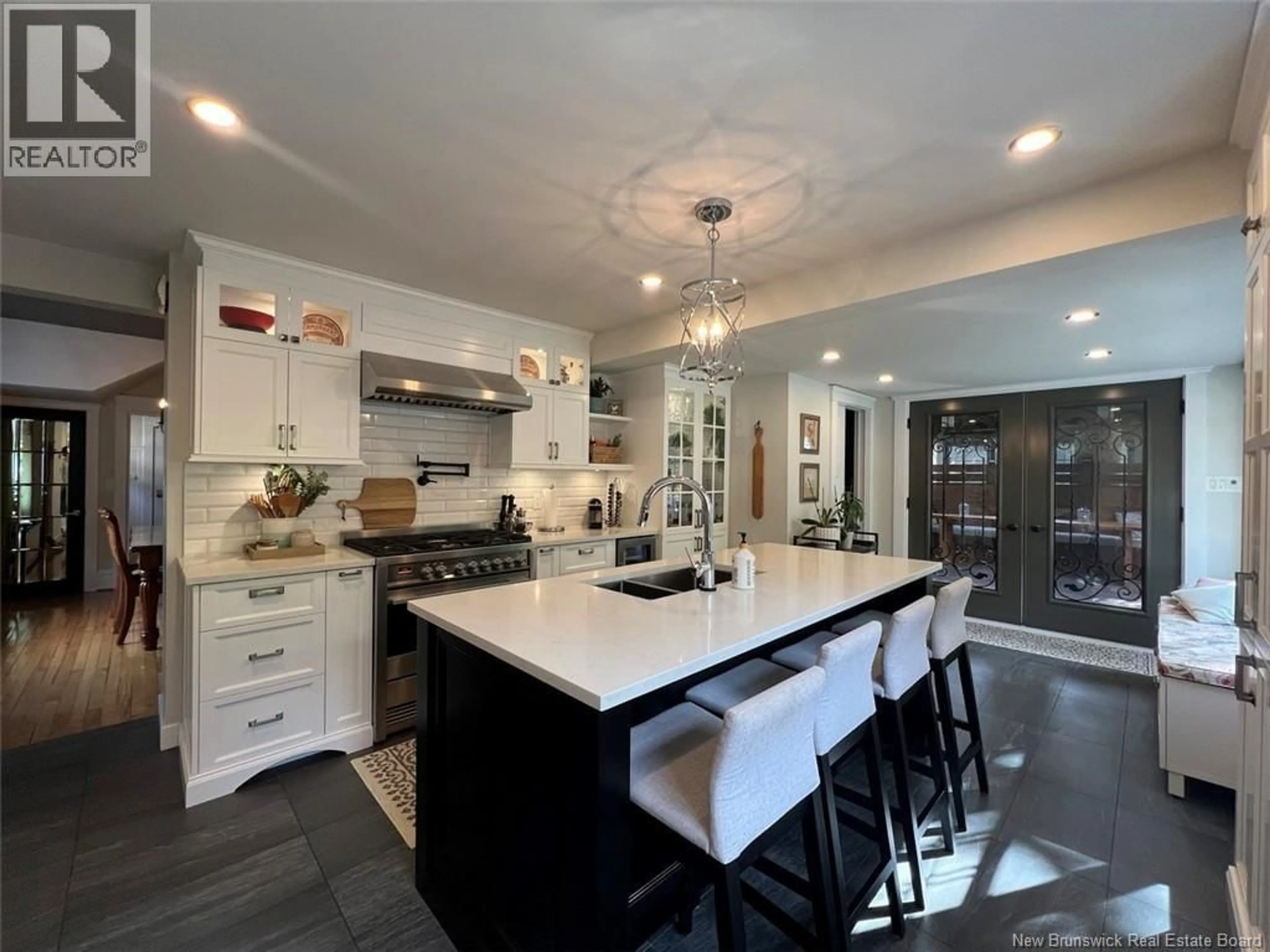 Open concept kitchen, ceramic/tile floor for 24 BURPEE STREET, Edmundston New Brunswick E3V1Z5