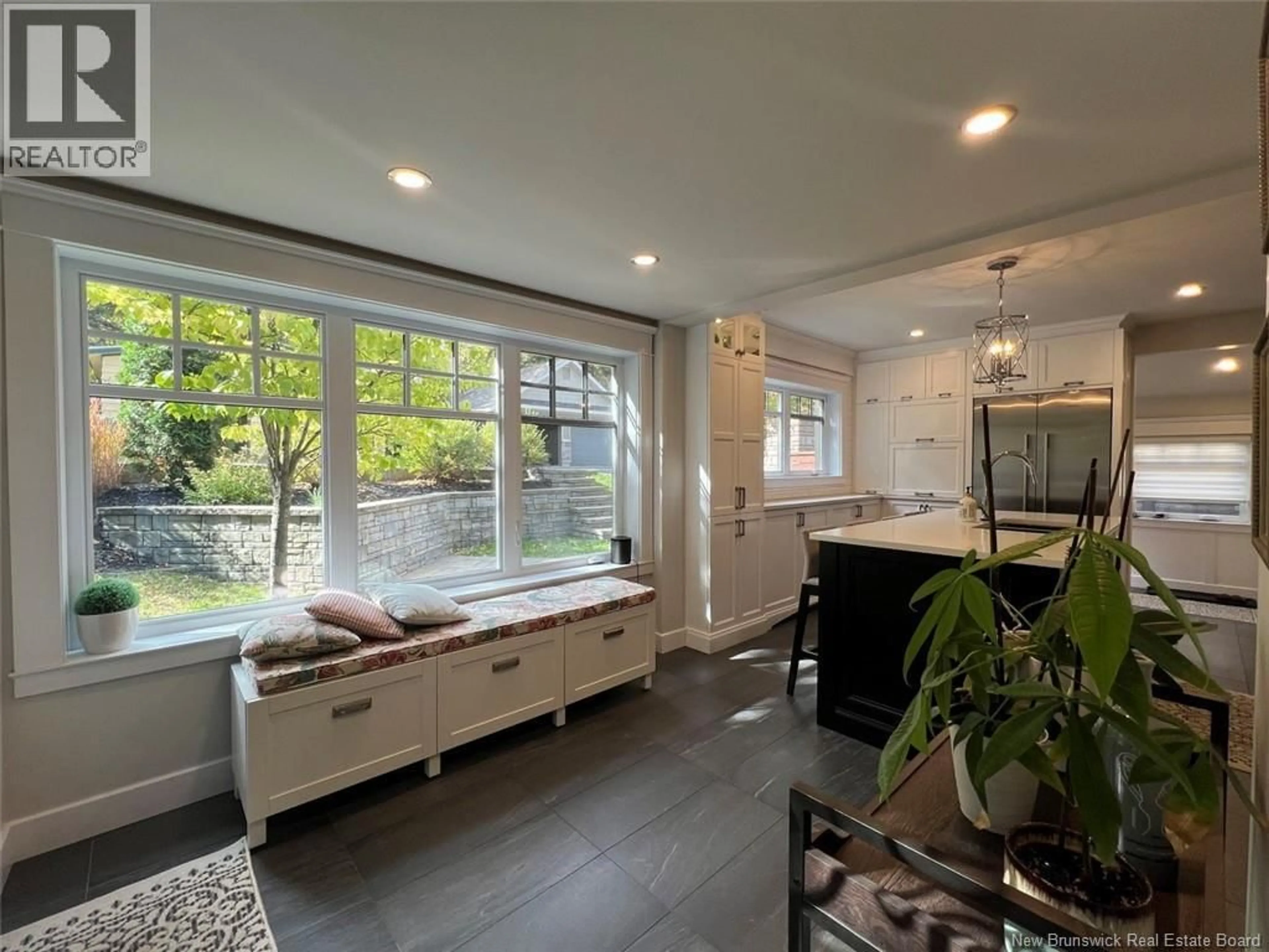 Open concept kitchen, ceramic/tile floor for 24 BURPEE STREET, Edmundston New Brunswick E3V1Z5