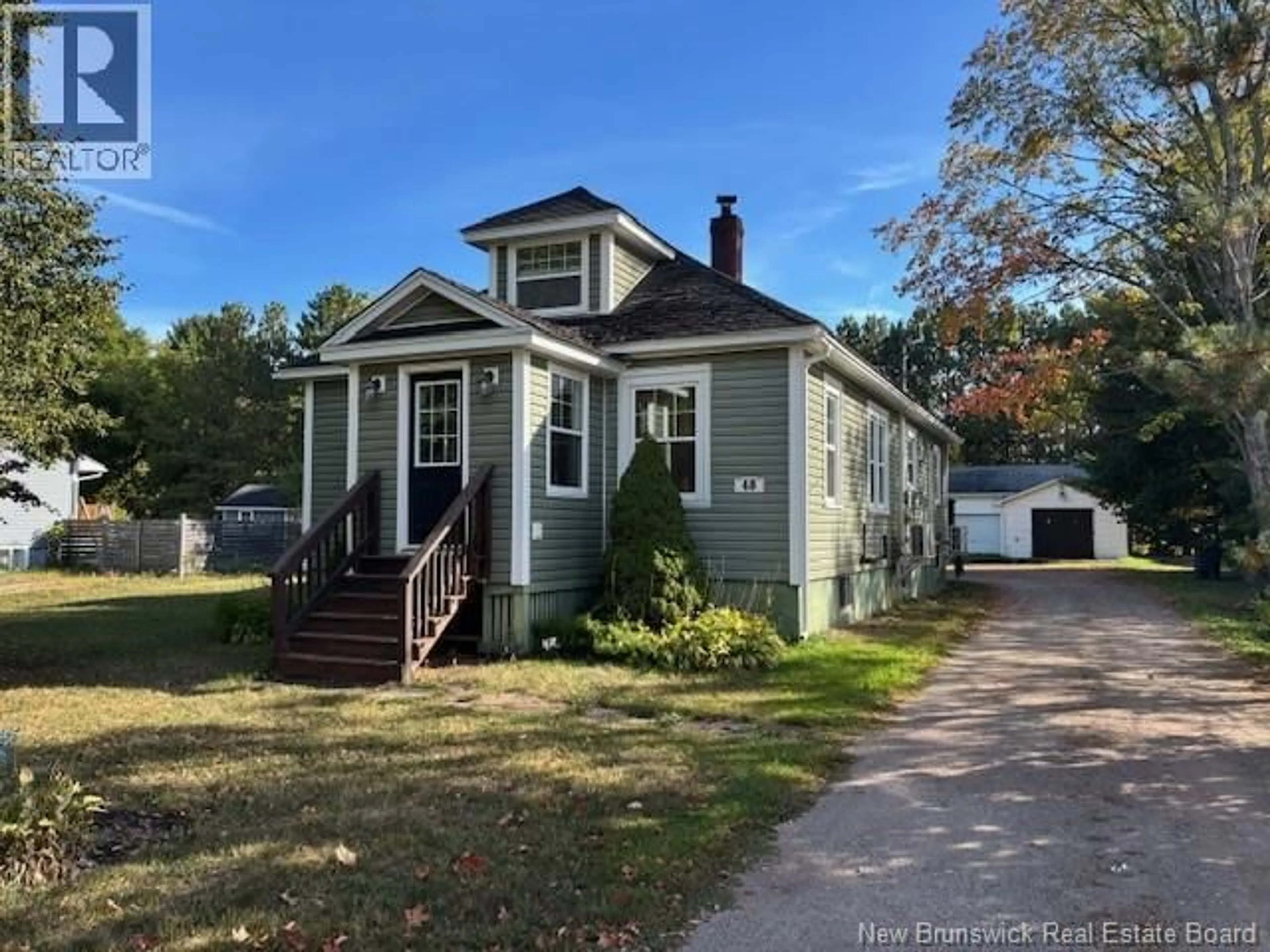 Home with vinyl exterior material, street for 48 NEEDLE STREET, Sussex Corner New Brunswick E4E2Z3