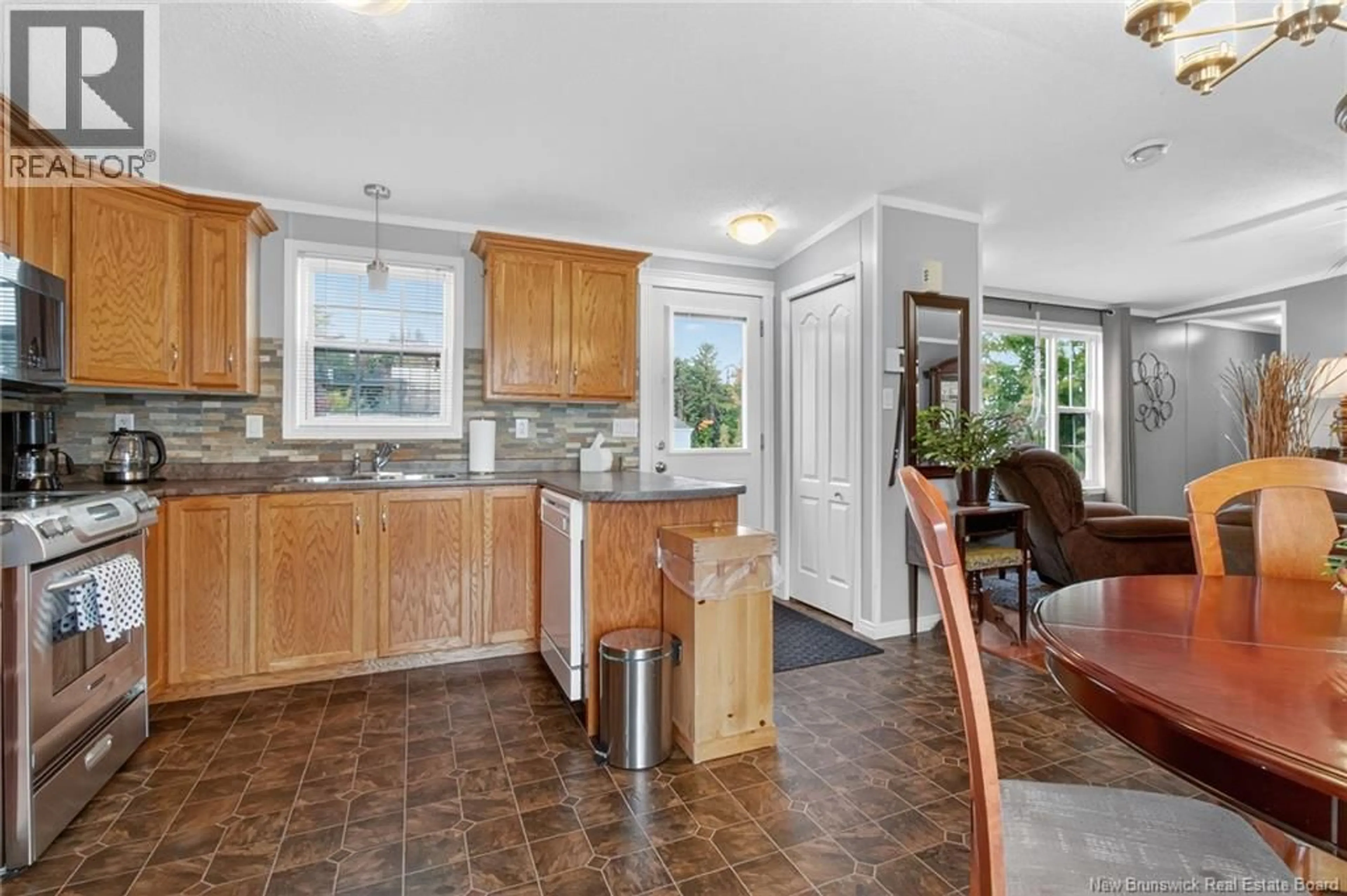 Open concept kitchen, ceramic/tile floor for 19 HAYWARD LANE, Riverview New Brunswick E1B5R1