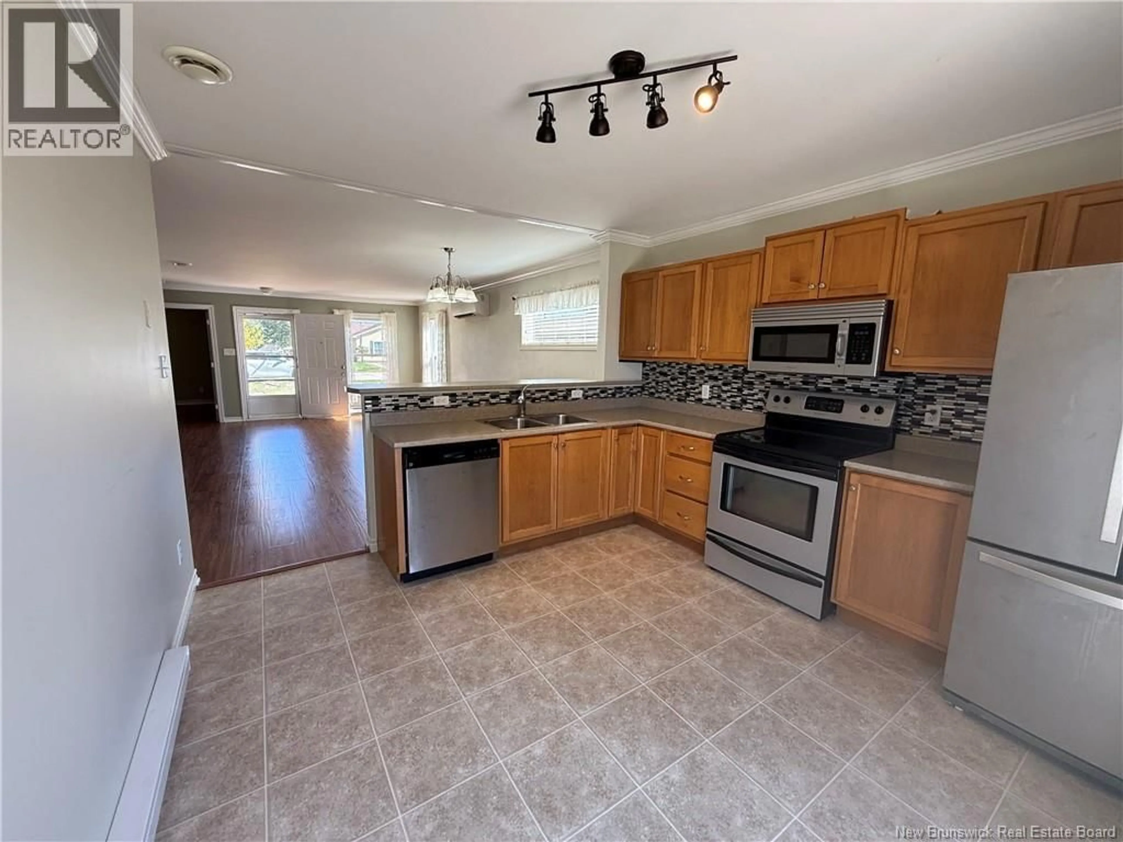Open concept kitchen, ceramic/tile floor for 15 IMPERIAL DRIVE, Sussex New Brunswick E4E0A7