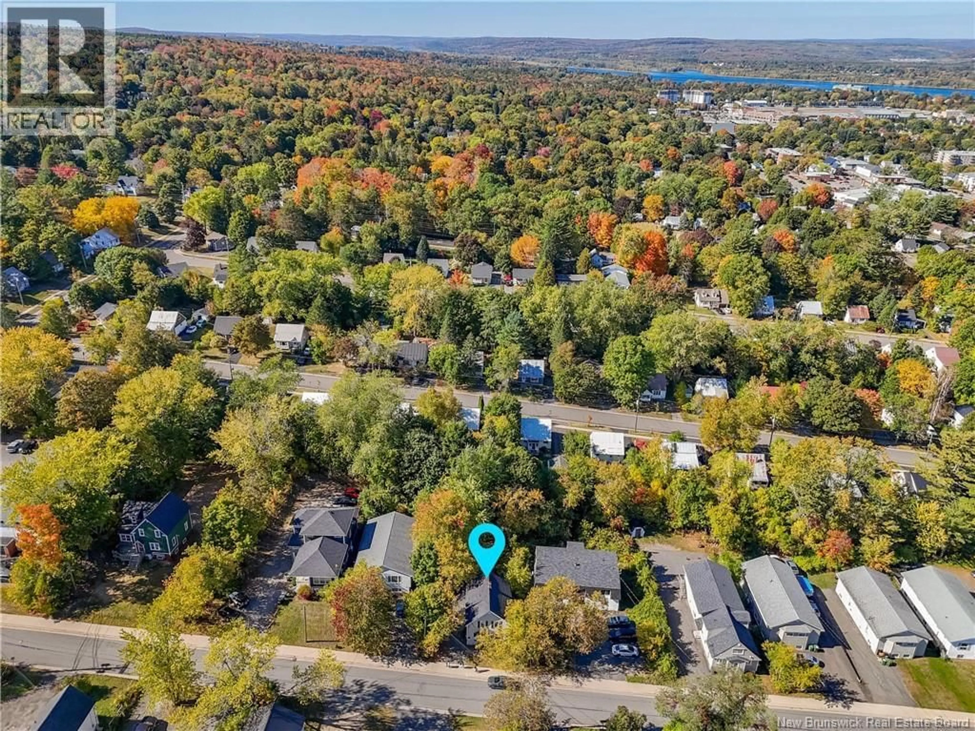 A pic from outside/outdoor area/front of a property/back of a property/a pic from drone, unknown for 689 GRAHAM AVENUE, Fredericton New Brunswick E3B4C2