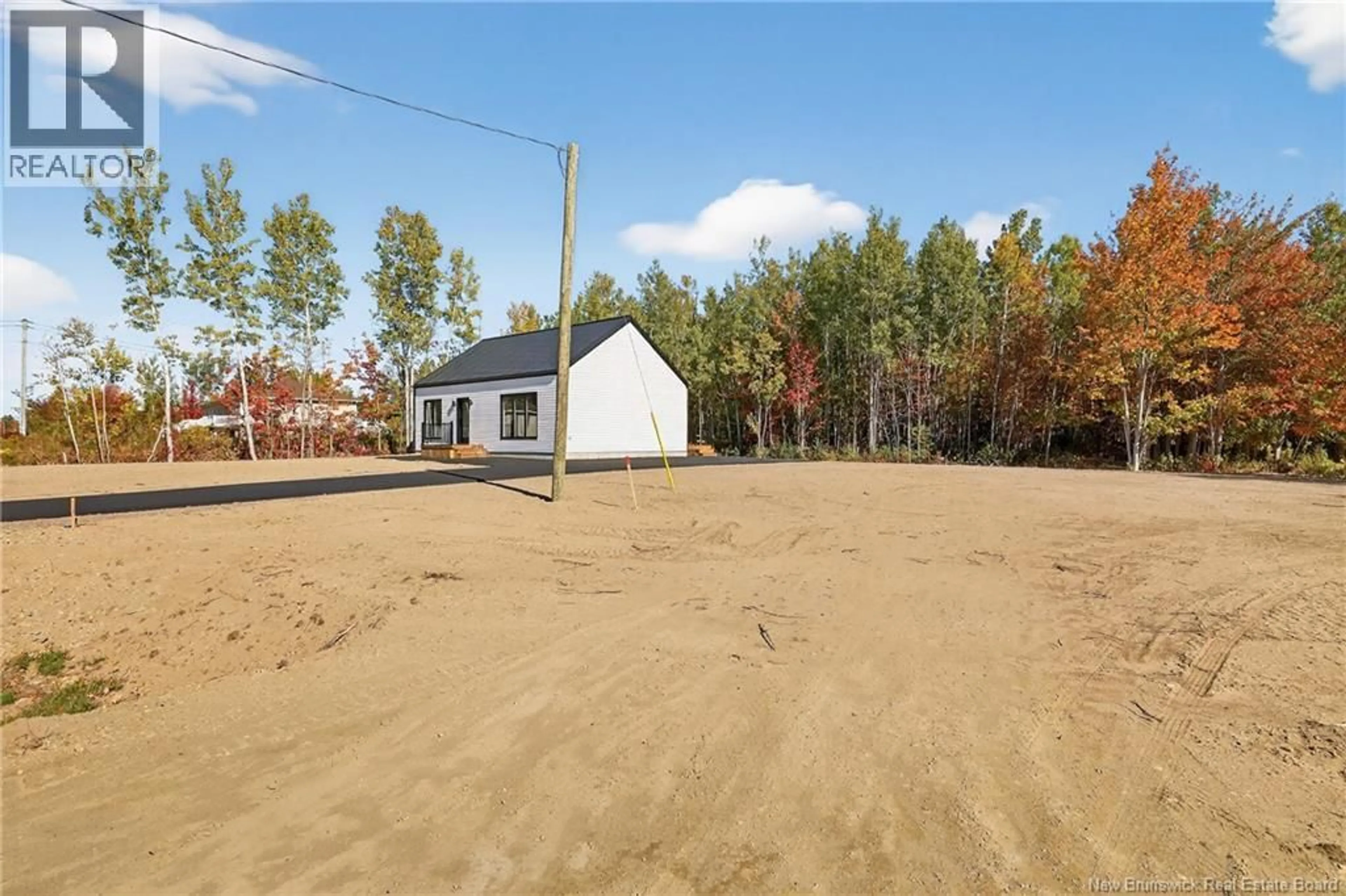 A pic from outside/outdoor area/front of a property/back of a property/a pic from drone, street for 4178 ROBINSON STREET, Tracadie New Brunswick E1X1C1