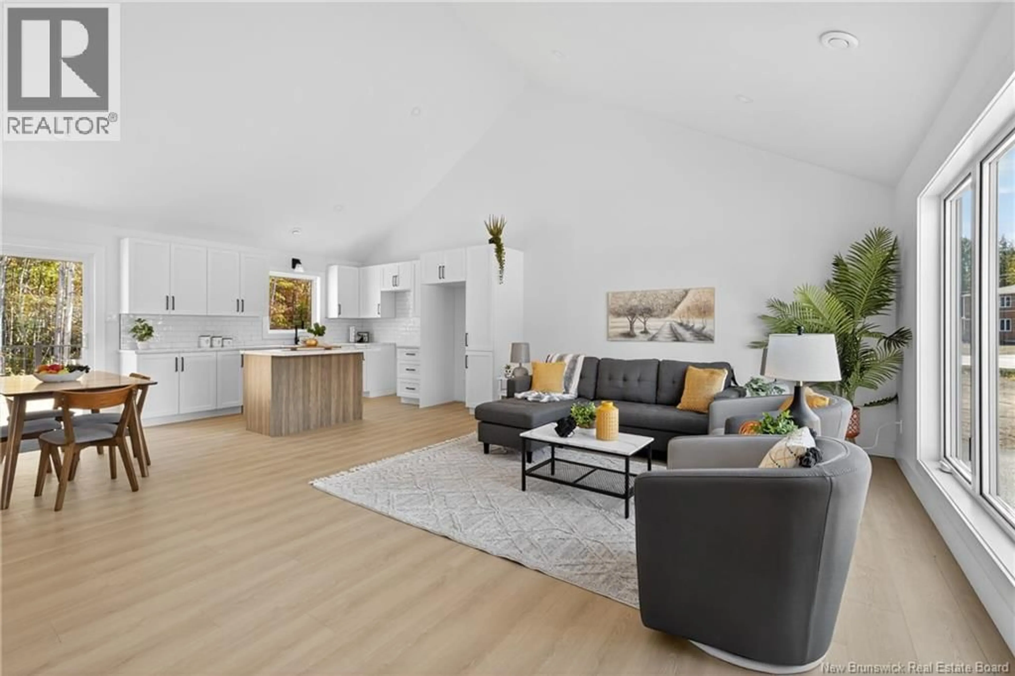 Living room with furniture, wood/laminate floor for 4178 ROBINSON STREET, Tracadie New Brunswick E1X1C1