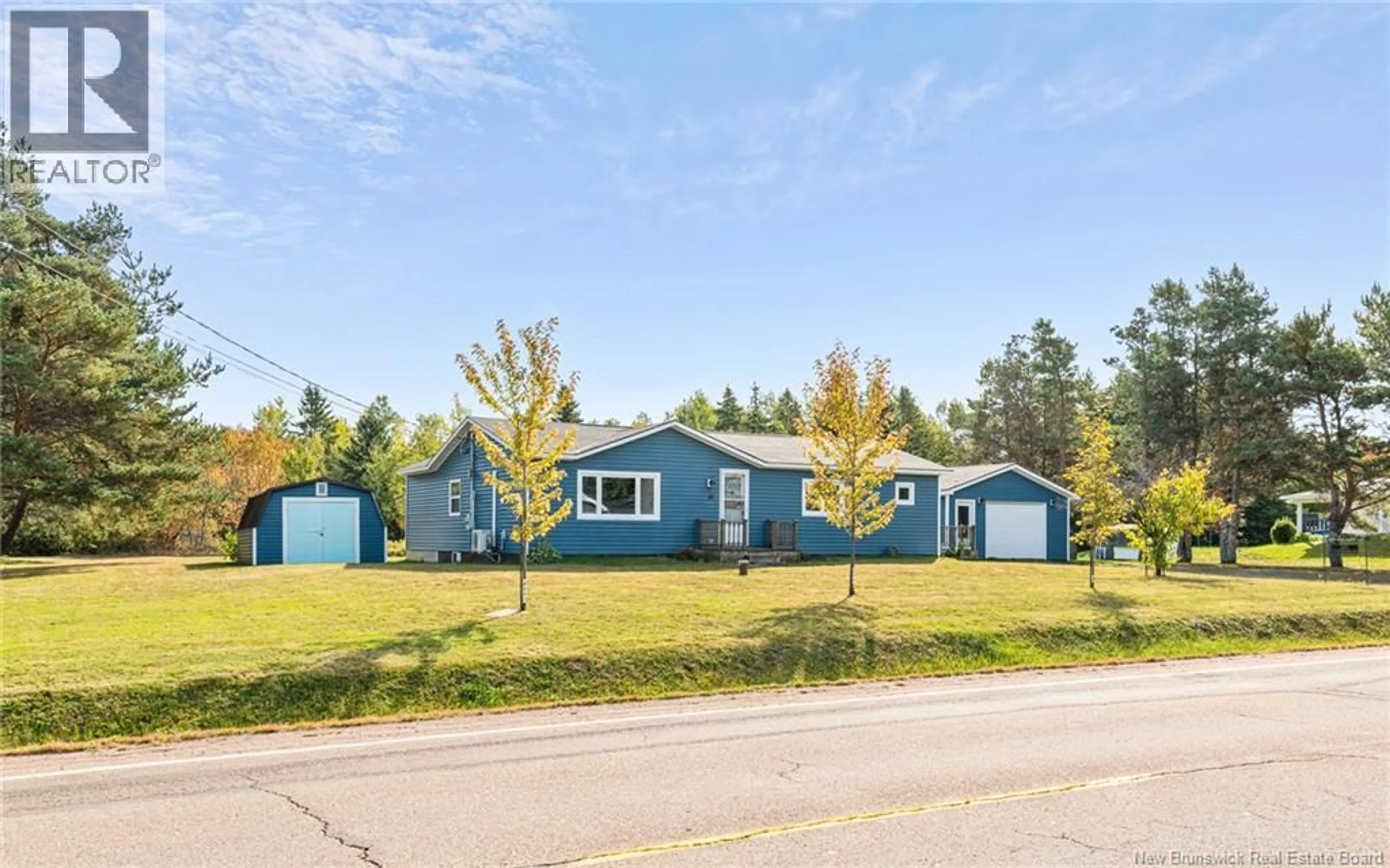 A pic from outside/outdoor area/front of a property/back of a property/a pic from drone, street for 38 ROUTE 933 HIGHWAY, Grand-Barachois New Brunswick E4P8K9