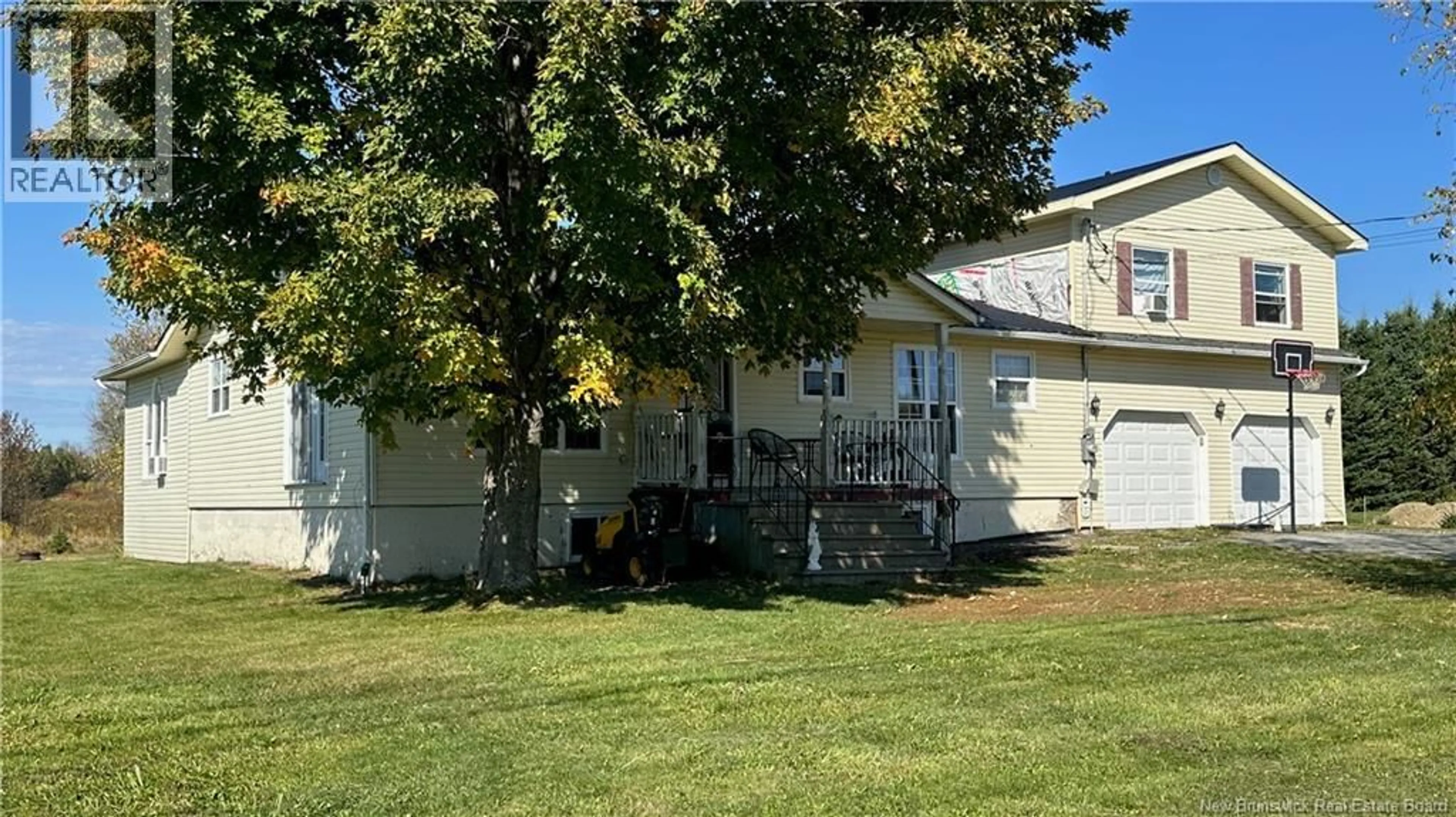 Home with vinyl exterior material, street for 3216 585 ROUTE ROUTE, Newbridge New Brunswick E7N1K3