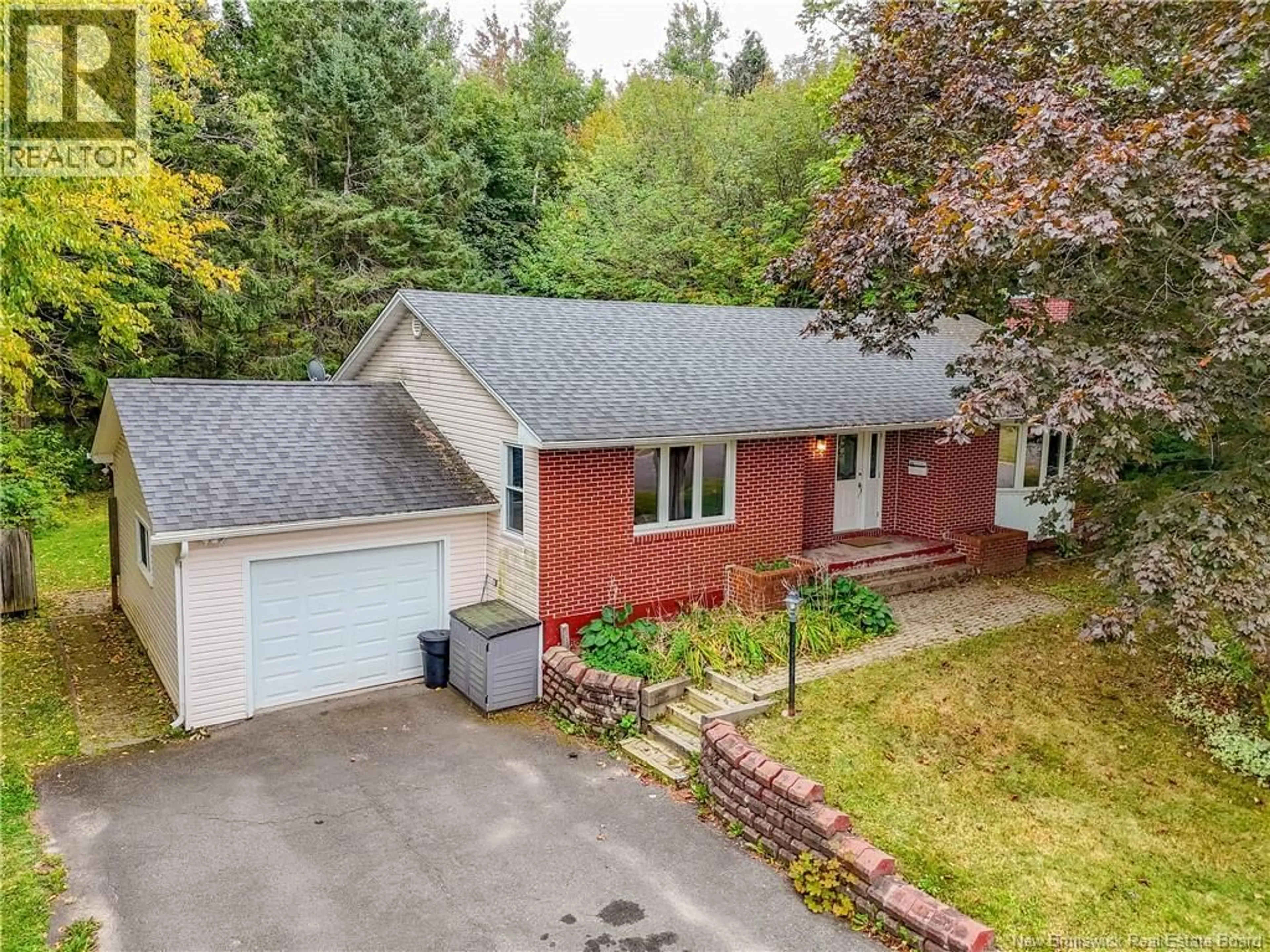 A pic from outside/outdoor area/front of a property/back of a property/a pic from drone, street for 35 EVANS DRIVE, Oromocto New Brunswick E2V2H3