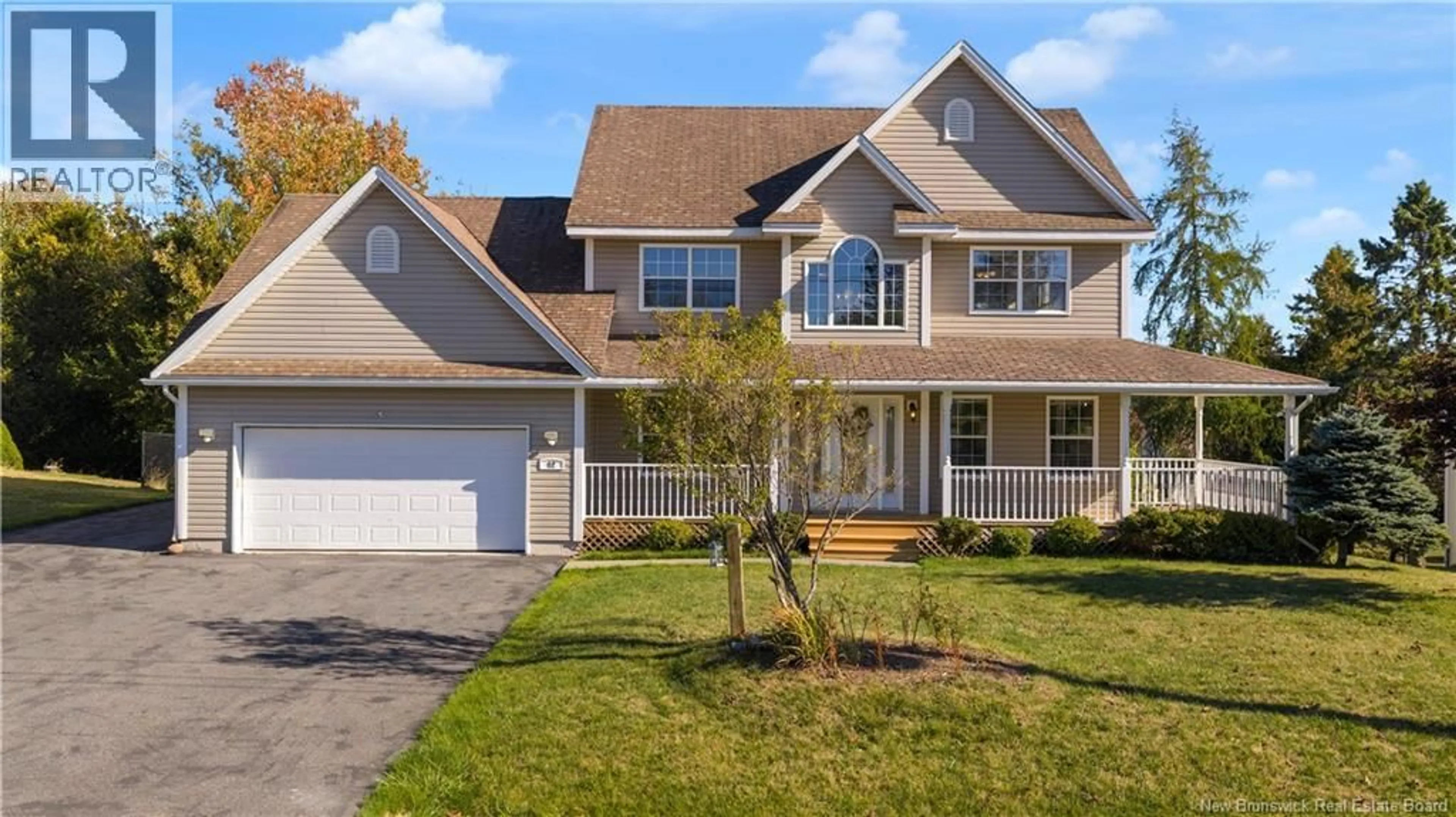 Home with vinyl exterior material, street for 12 REFLECTION LANE, Quispamsis New Brunswick E2E6E7
