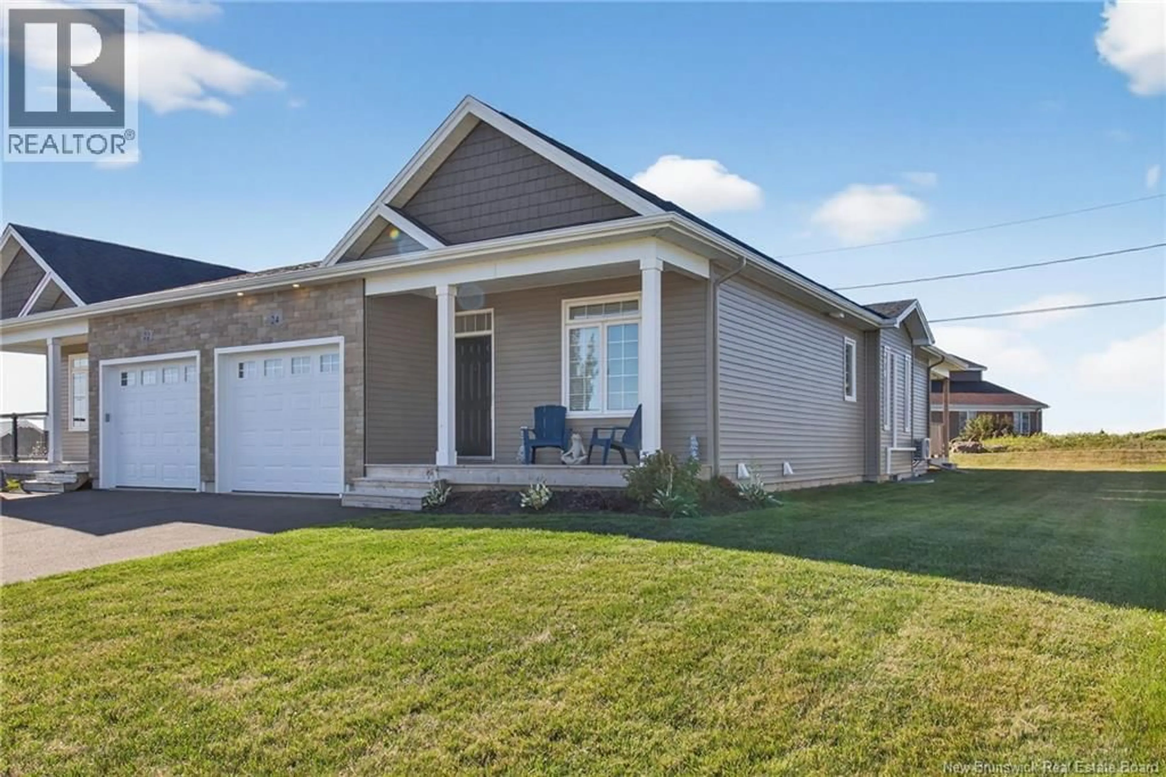 Home with vinyl exterior material, street for 24 EAGLEWOOD DRIVE, Moncton New Brunswick E1H0H3