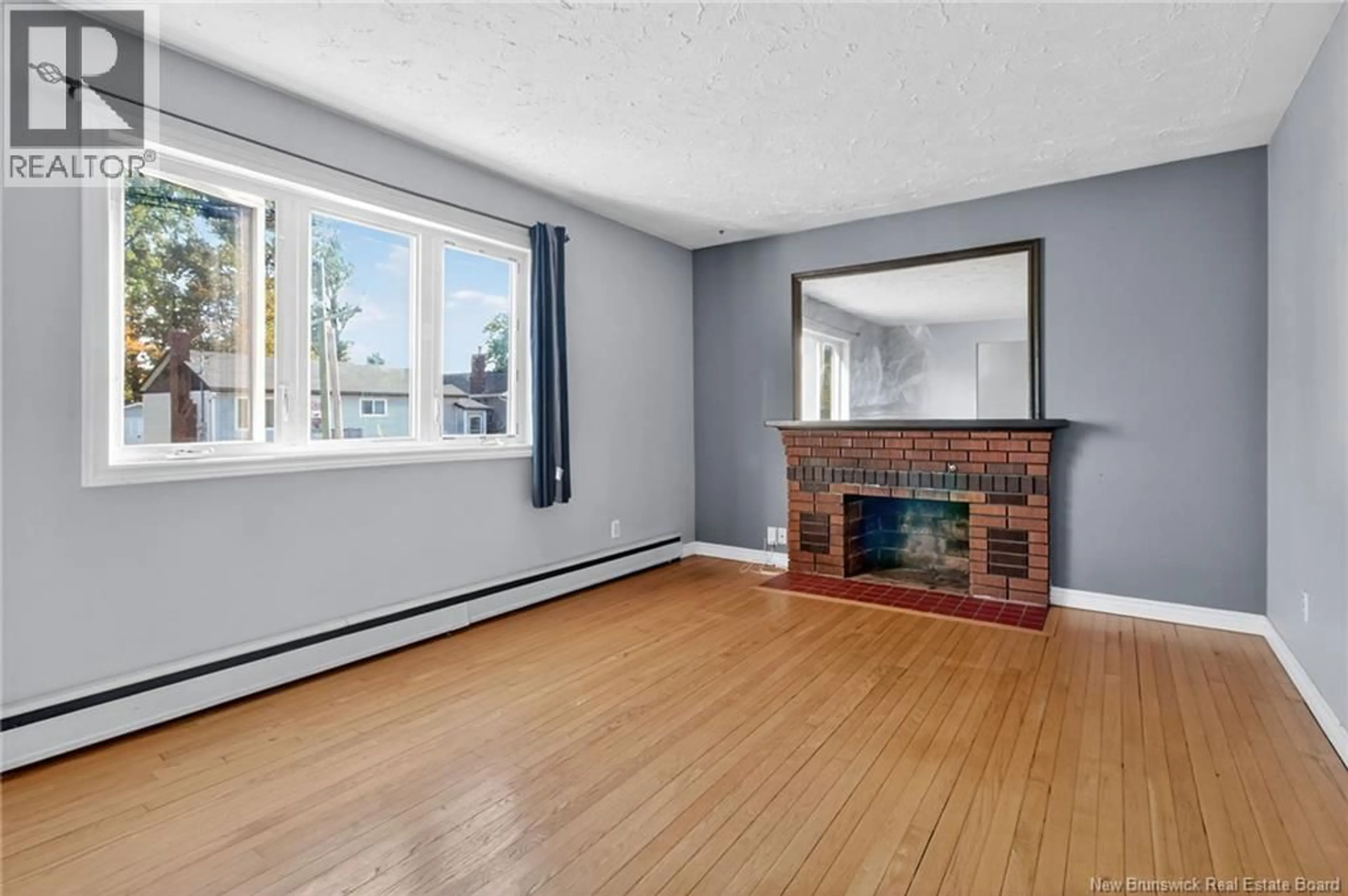 Living room with furniture, unknown for 14 CAMBRIDGE STREET, Moncton New Brunswick E1C7R1