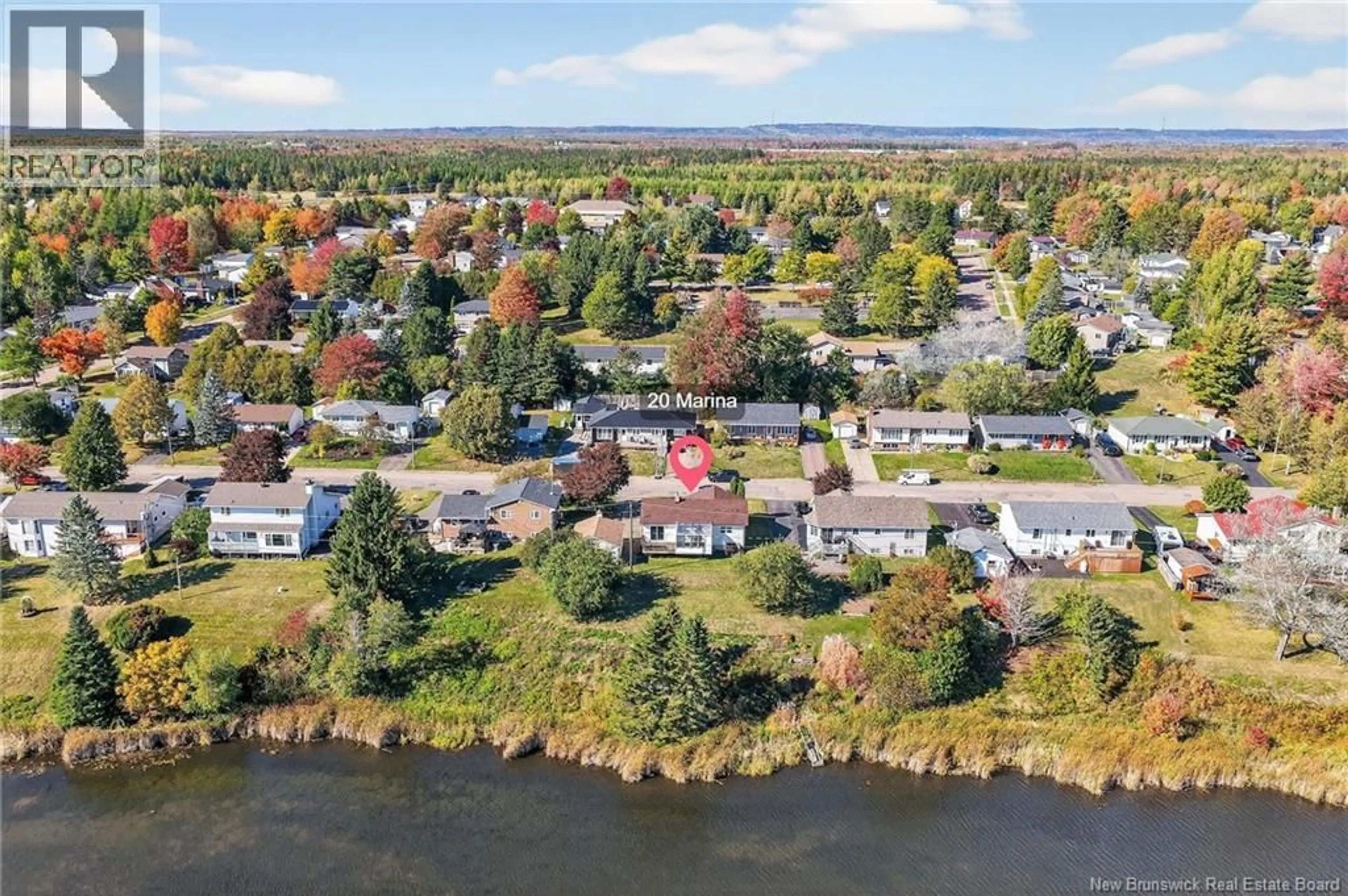 A pic from outside/outdoor area/front of a property/back of a property/a pic from drone, water/lake/river/ocean view for 20 MARINA DRIVE, Moncton New Brunswick E1E4B6