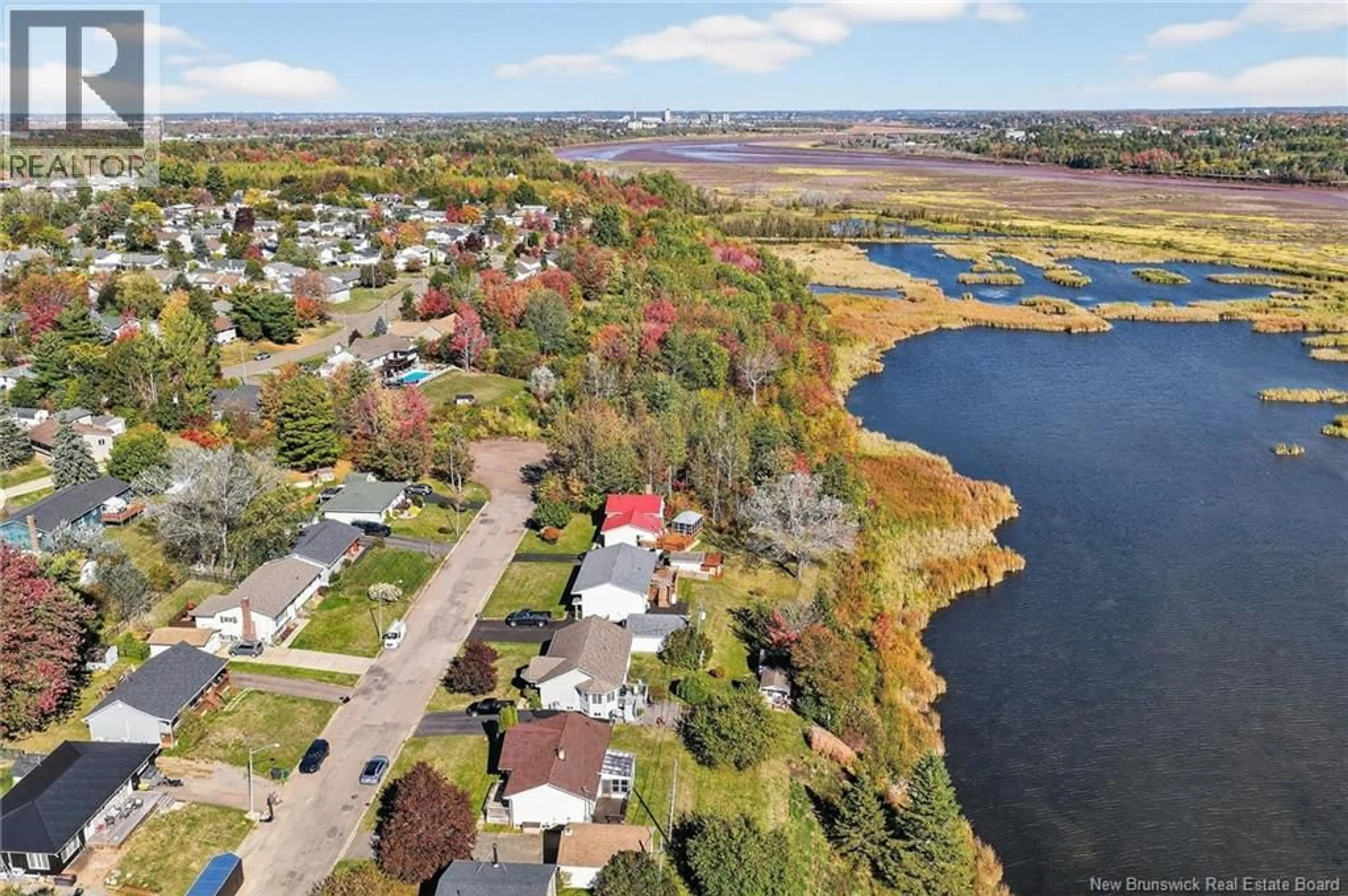 A pic from outside/outdoor area/front of a property/back of a property/a pic from drone, water/lake/river/ocean view for 20 MARINA DRIVE, Moncton New Brunswick E1E4B6