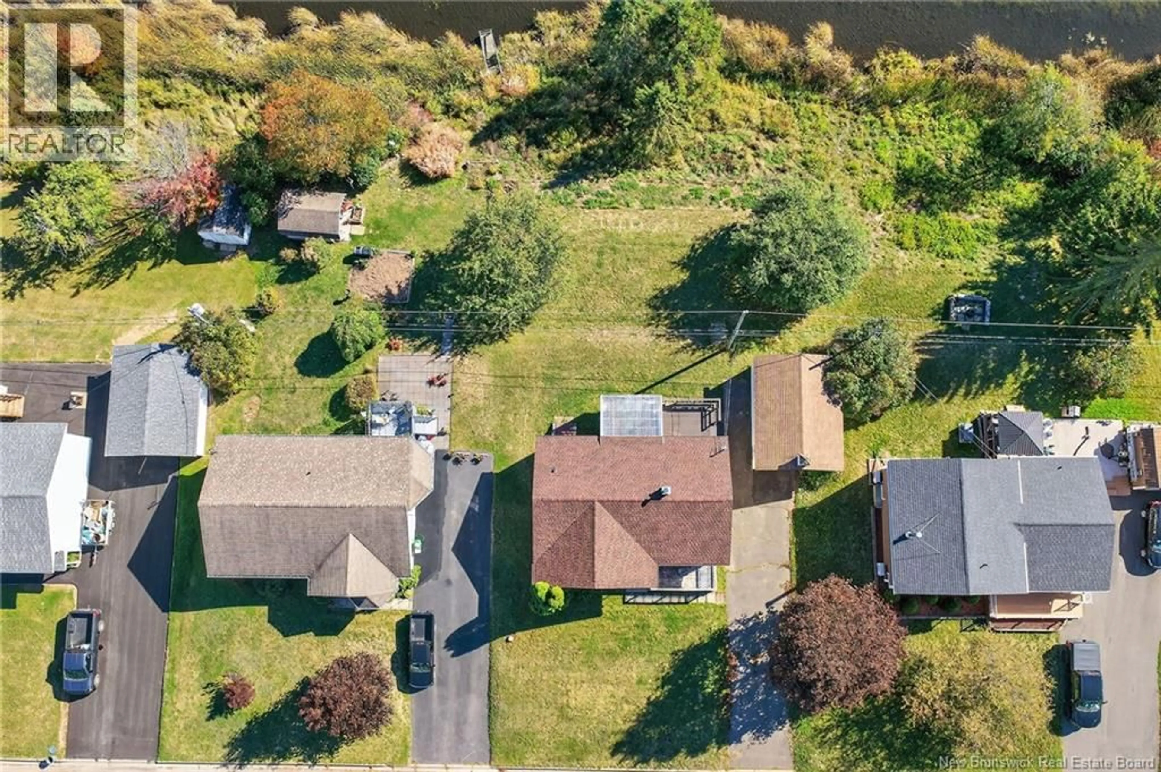 A pic from outside/outdoor area/front of a property/back of a property/a pic from drone, street for 20 MARINA DRIVE, Moncton New Brunswick E1E4B6